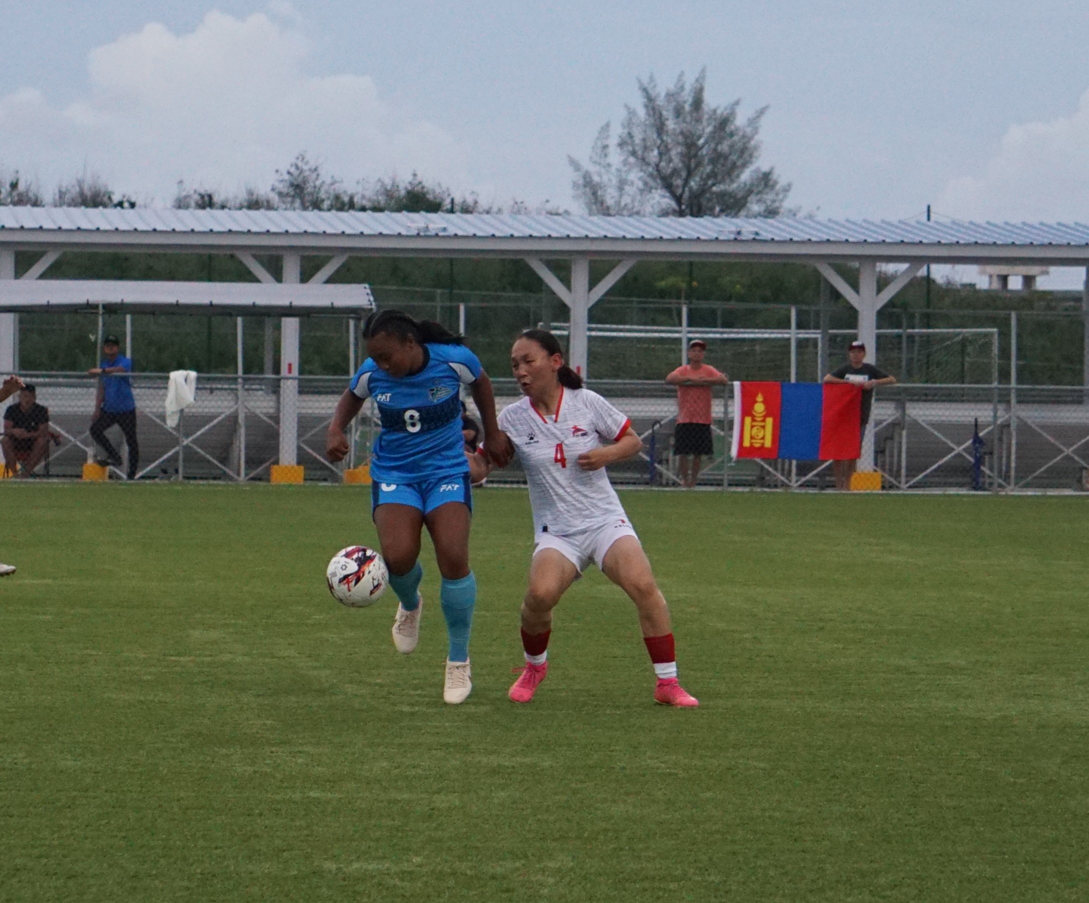 The NMI's Jannah Casarino controls the possession as a Mongolia defender closes in during the opening match of the NMIFA Women’s U21 Three Nations Cup 2024 at the NMI Soccer Training Center in Koblerville Tuesday night.