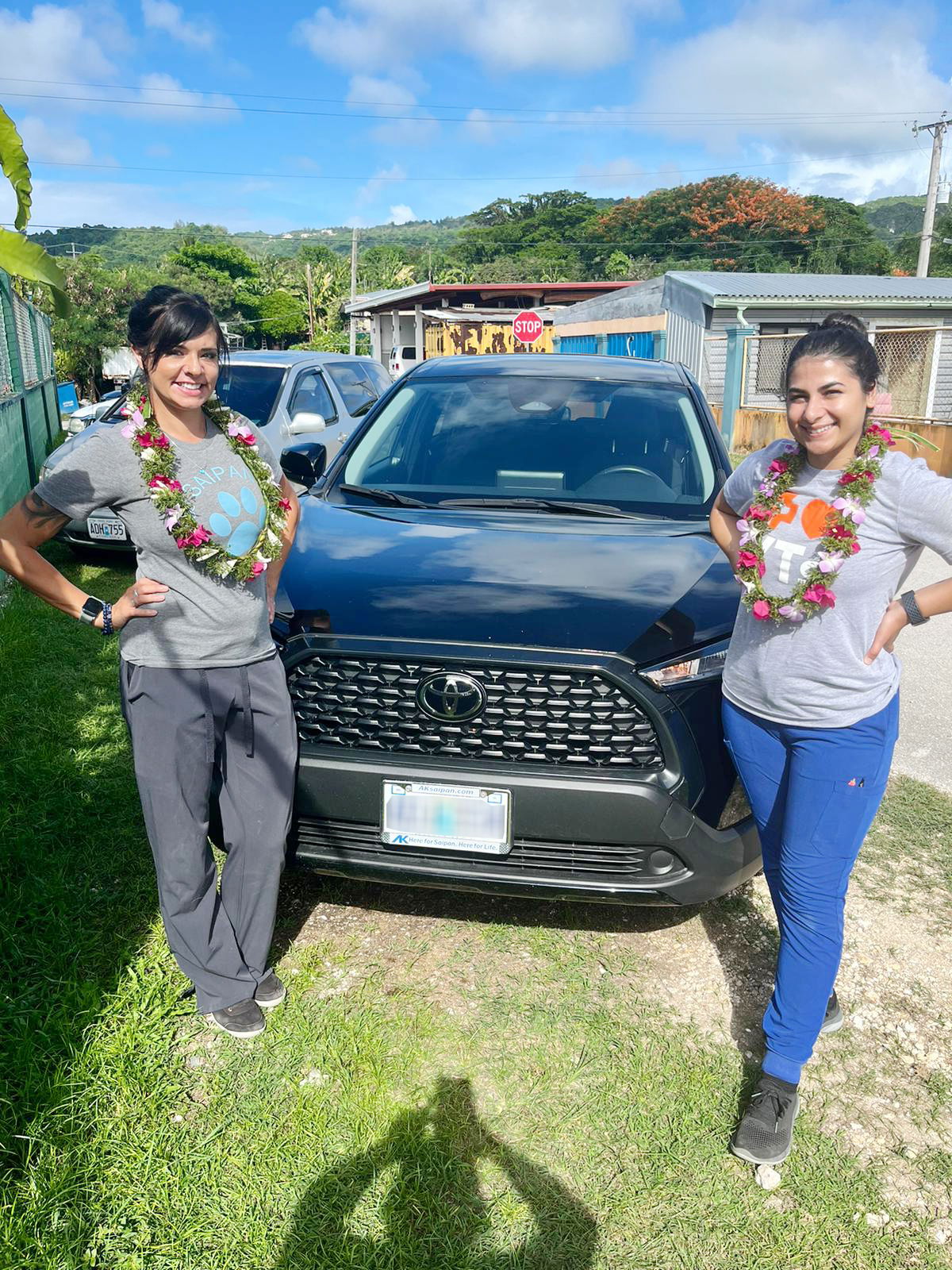 Visiting veterinary technicians Lacey Frame and Shahrzon Abdi pose for a photo at the Saipan Humane Society clinic in Garapan.