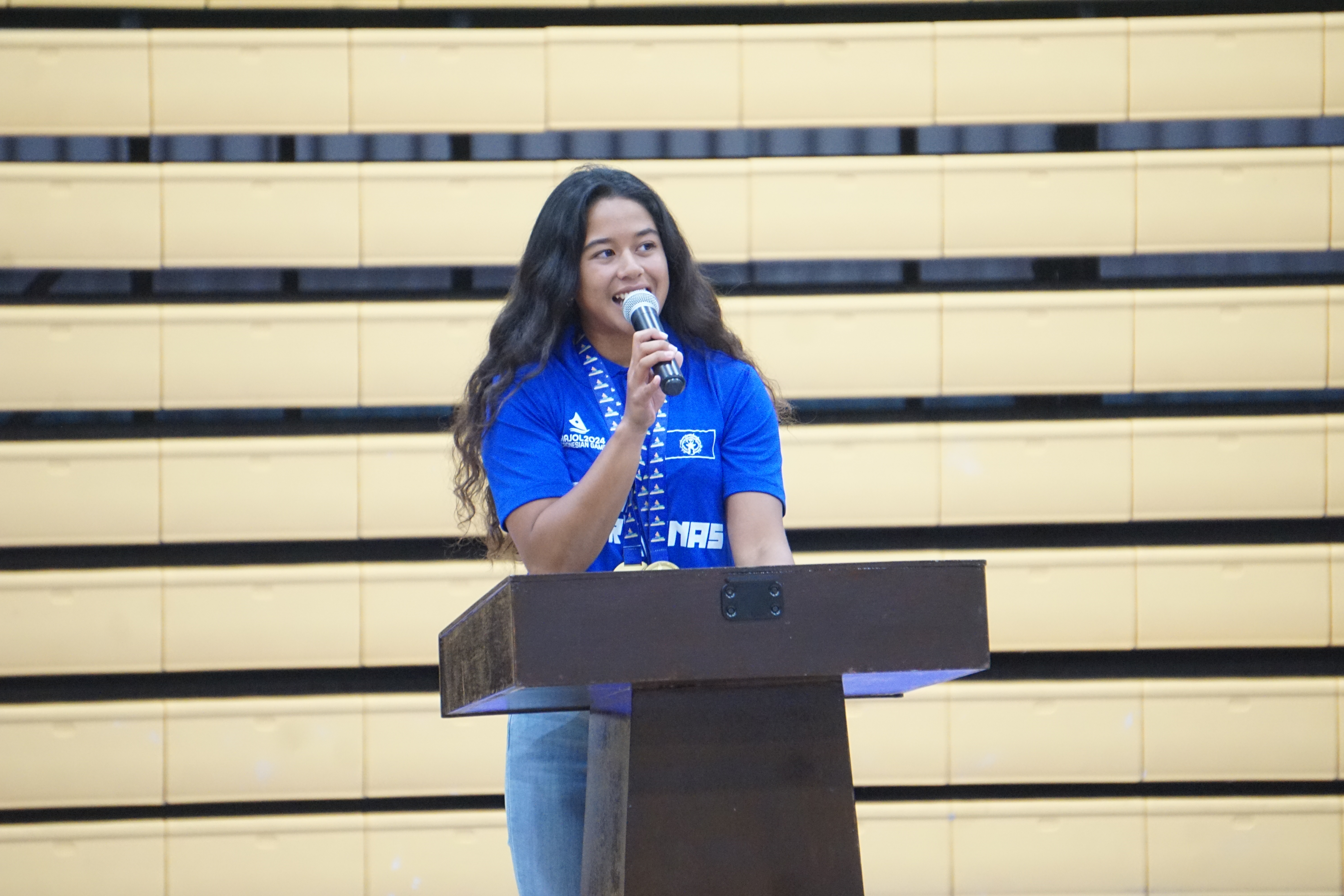 NMI weightlifter and Micro Games gold medalist Kaya Rasa delivers her remarks during the Appreciation Night hosted by the Northern Marianas Sports Association at the Ada gym on Tuesday.