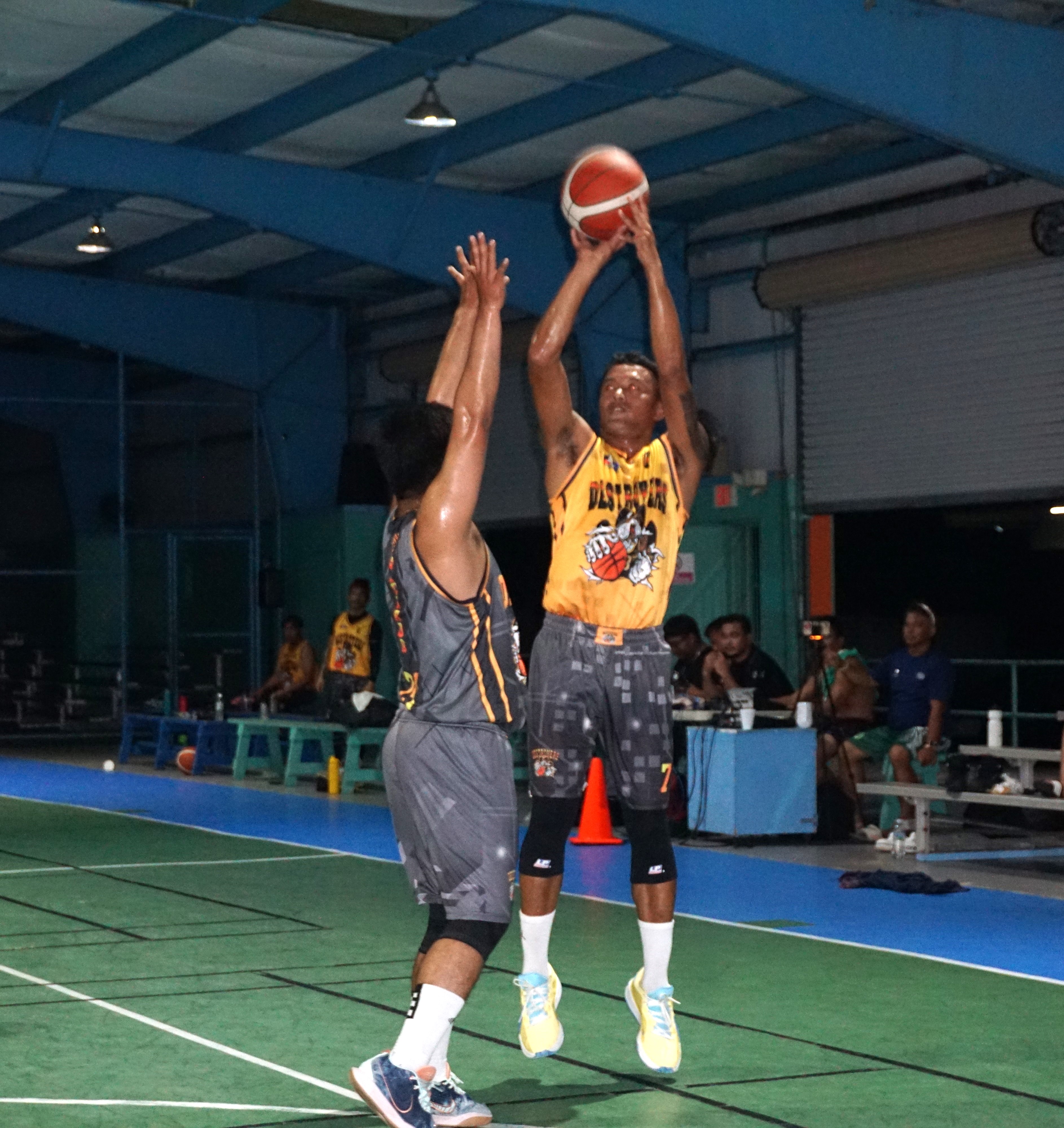 Vizion Insurance's Robes Ales pulls up for the contested three-point shot during a semifinals game against Elite Force in the 2024 Destroyers Friendly Games League at the TSL Sports Complex on Sunday.