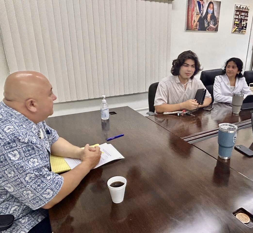 Commissioner of Education Dr. Lawrence F. Camacho with Youth Congress Speaker Vinnie Juan Q. Sablan and Youth Senator Soledad Maria Tudela Sablan.