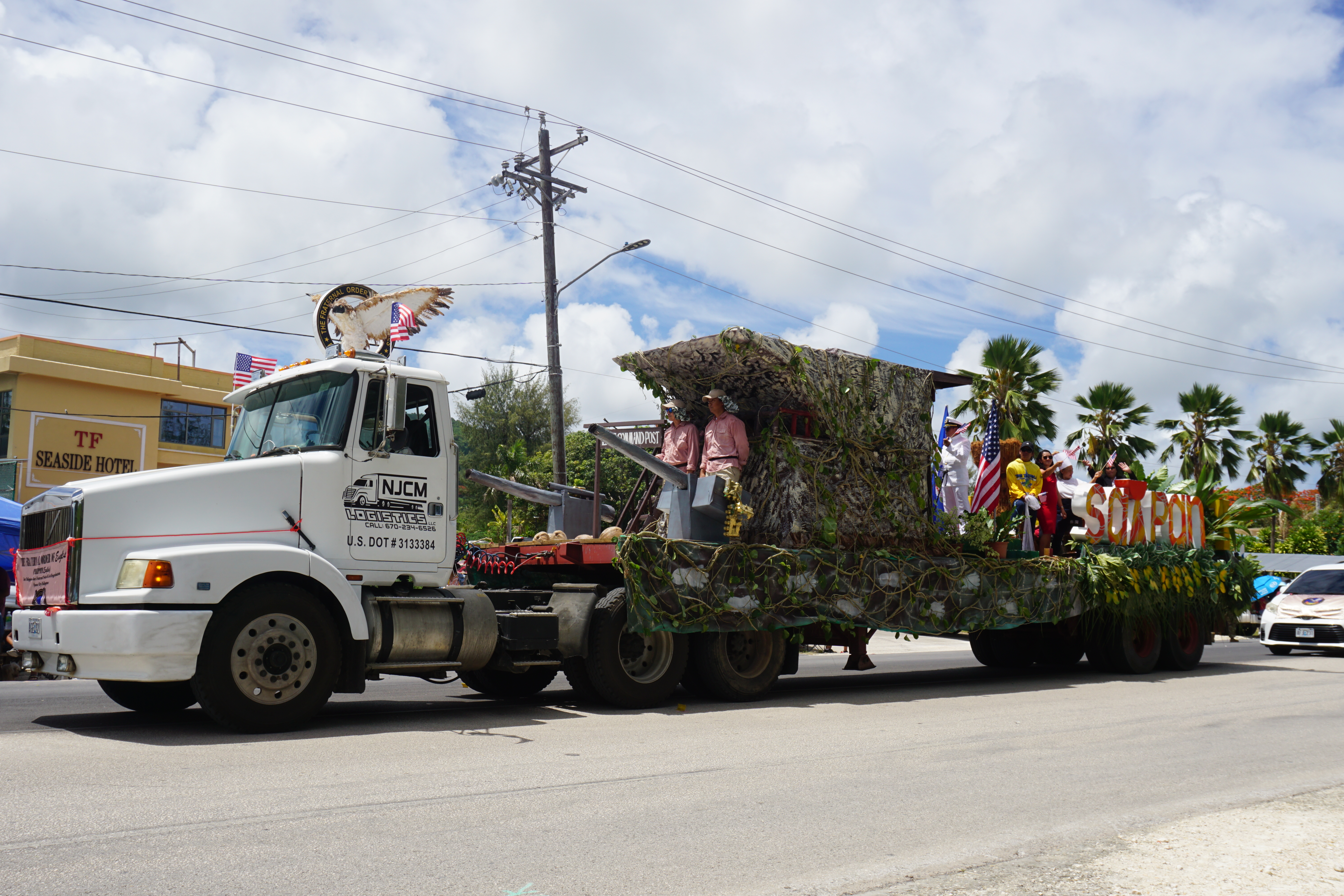 The Fraternal Order of Eagles-Saipan Magalahi Eagles Club float drives down Beach Road during the 78th Liberation Day parade.