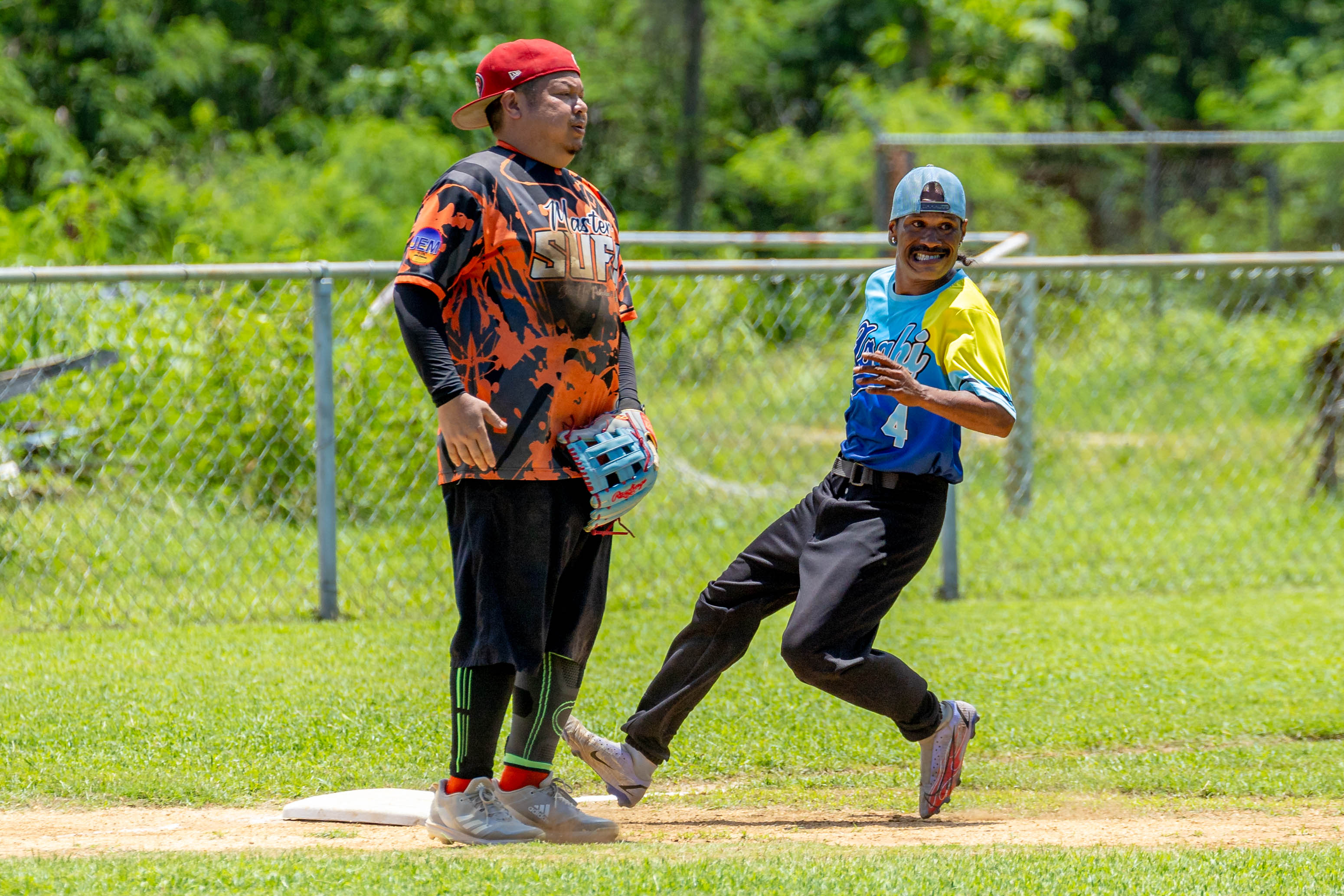 Asahi's Matsutaro sprints to Third as the flies off to centerfield.