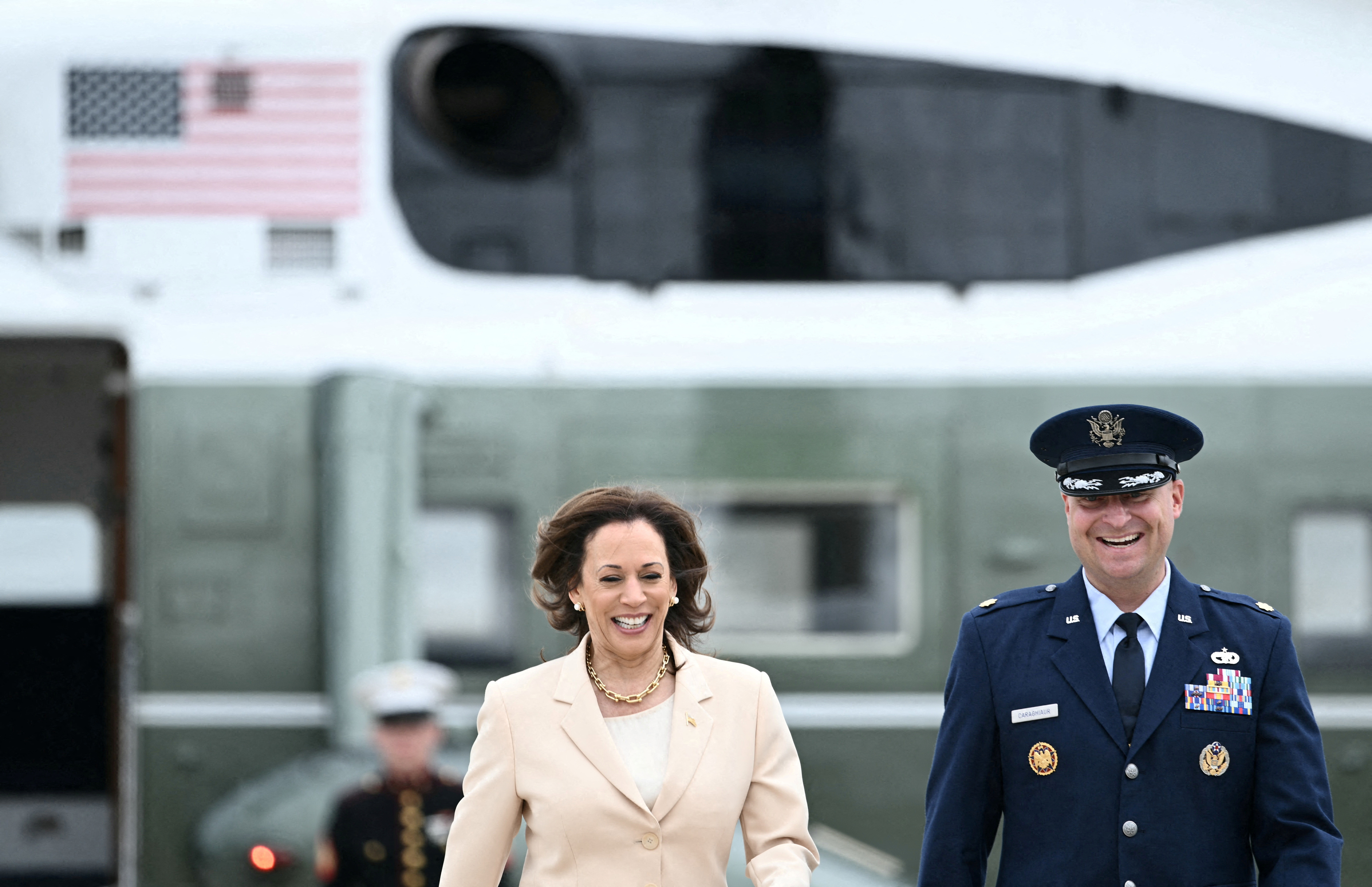 Vice President Kamala Harris is welcomed by U.S. Air Force Operations Officer Philip Phillip Caraghiaur as she arrives to board Air Force Two at Joint Base Andrews in Maryland, on July 24, 2024.