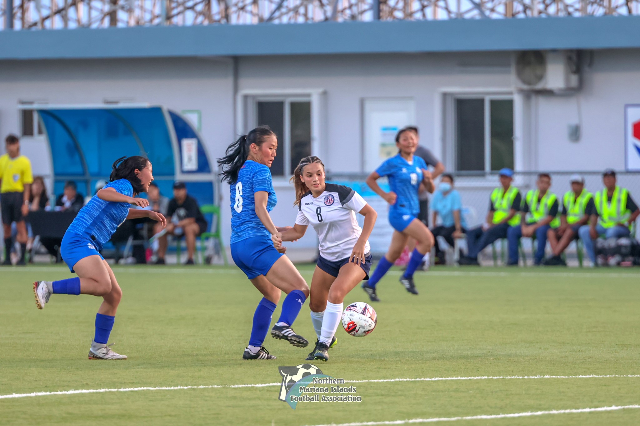 Guam Women's U21 National Team's Olivia Haddock dribbles past a Mongolian defender during their Three Nations Cup match at the NMI Soccer Training Center in Koblerville on Wednesday.