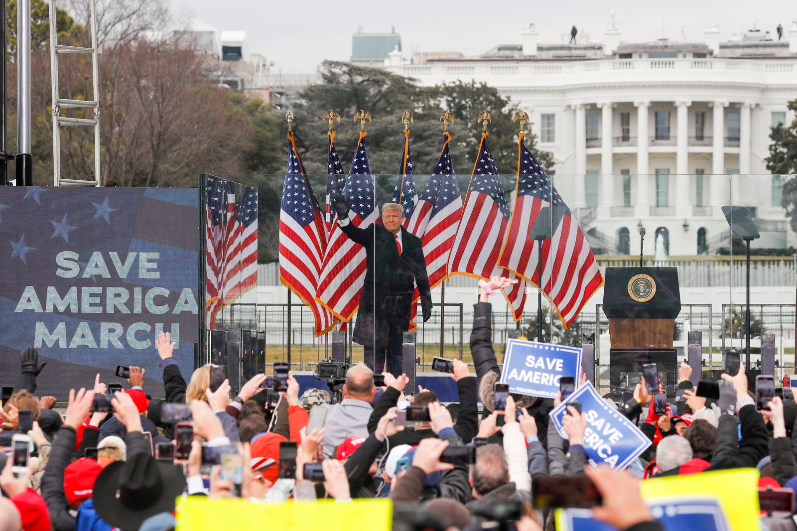 Then-President Donald Trump waves to supporters during a rally to contest the certification of the 2020  presidential election results by the U.S. Congress, in Washington, D.C., January 6, 2021.