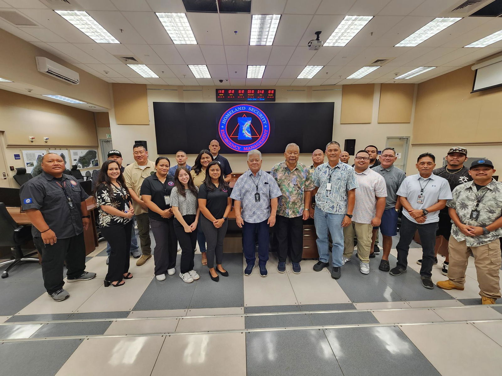 Gov. Arnold I. Palacios, Lt. Gov. David M. Apatang, CNMI Office of Homeland Security and Emergency Management Special Assistant Franklin Babauta, FEMA Region 9 Team Lead Brian Beck and other FEMA and HSEM officials pose for a photo at the Emergency Operations Center on Capital Hill on Monday.