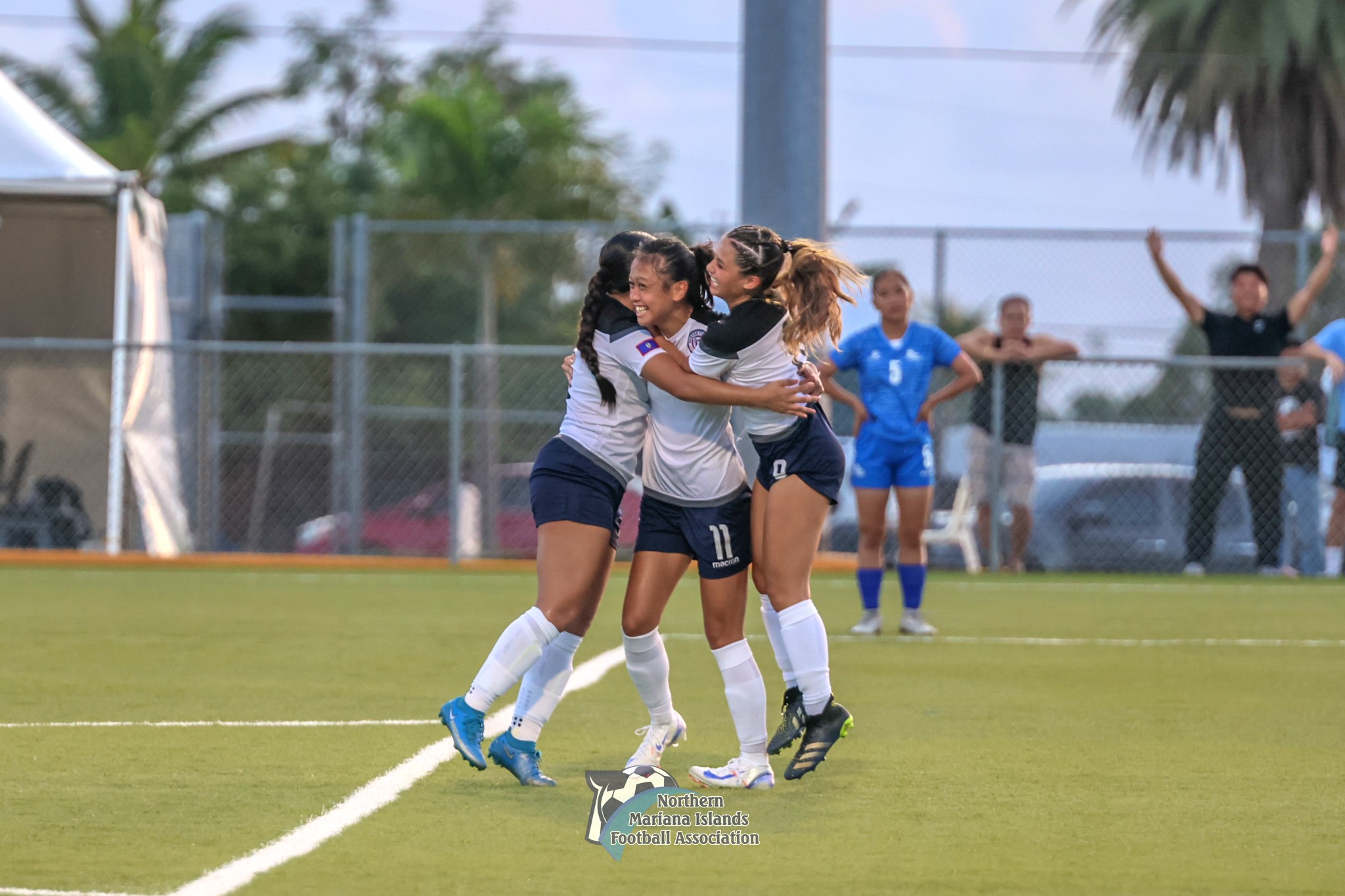Guam players celebrate after scoring a goal against Mongolia.