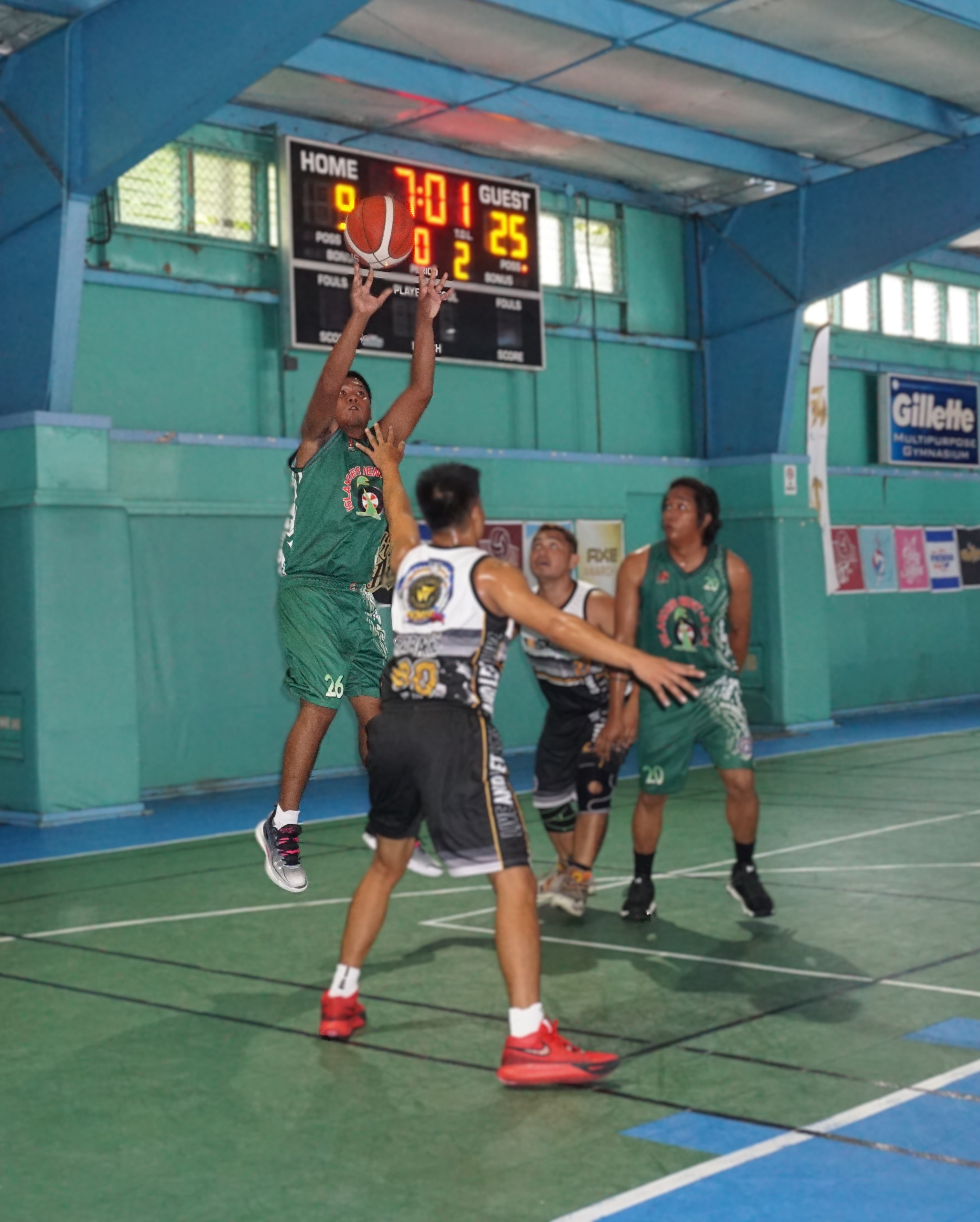Island Rent-A-Car's Jerome Director pulls up for the corner jumper during a game against Triskelion in the Destroyers Basketball Club Invitational Basketball League 2024 at the TSL Sports Complex on Sunday.