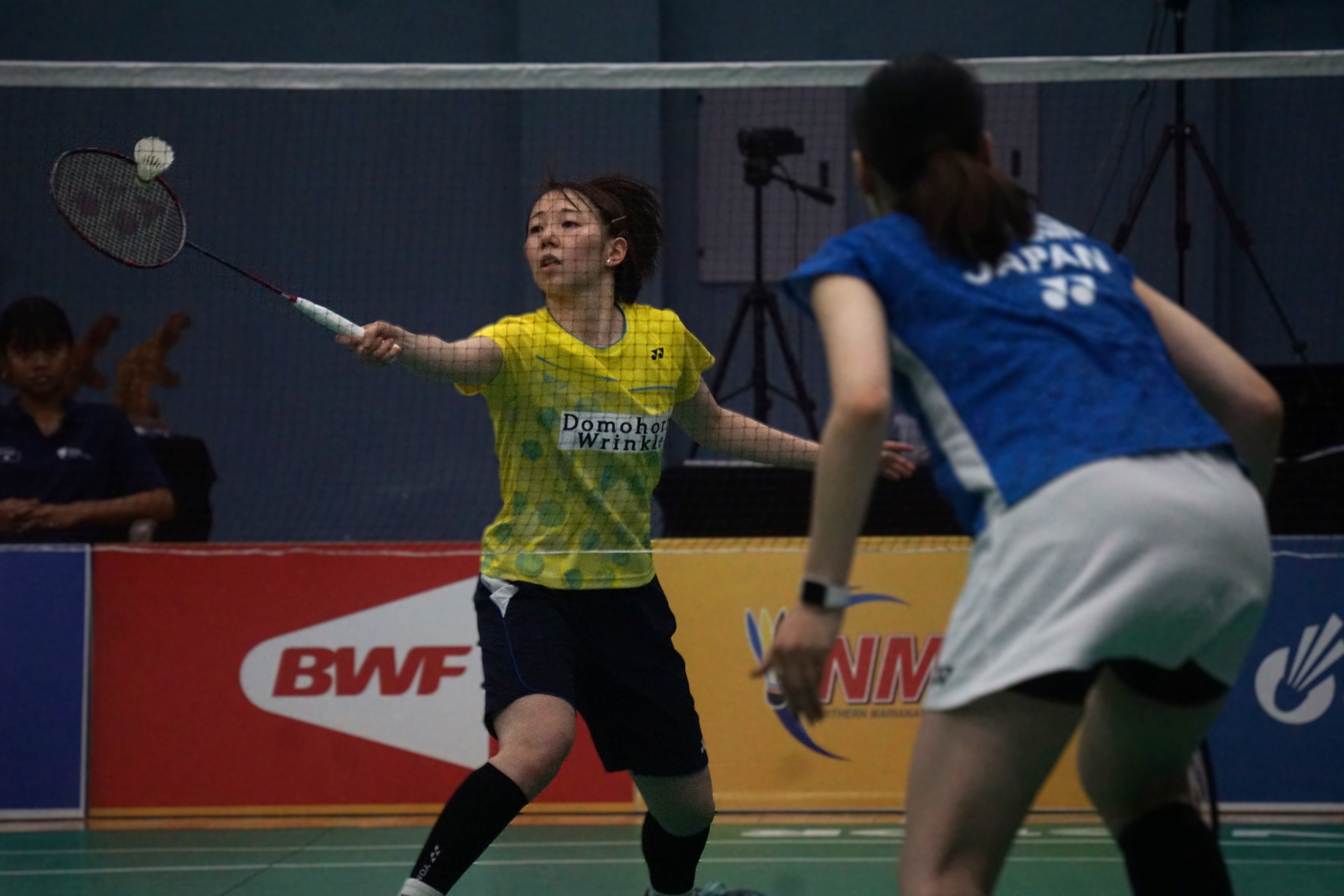 Riko Gunji extends for the forehand return during a women's singles final match against Asuka Takahashi in the Dove Saipan International 2024 at the Ada gym on Saturday.