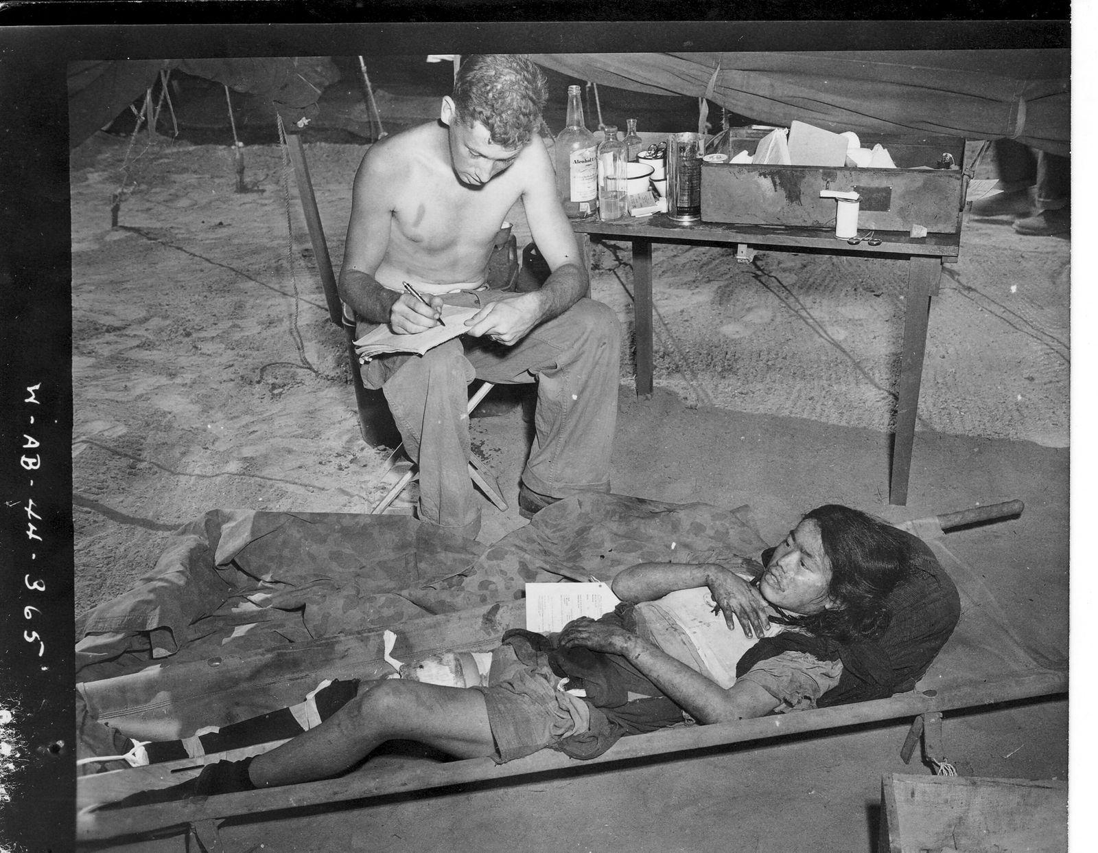 Doctor with injured woman.