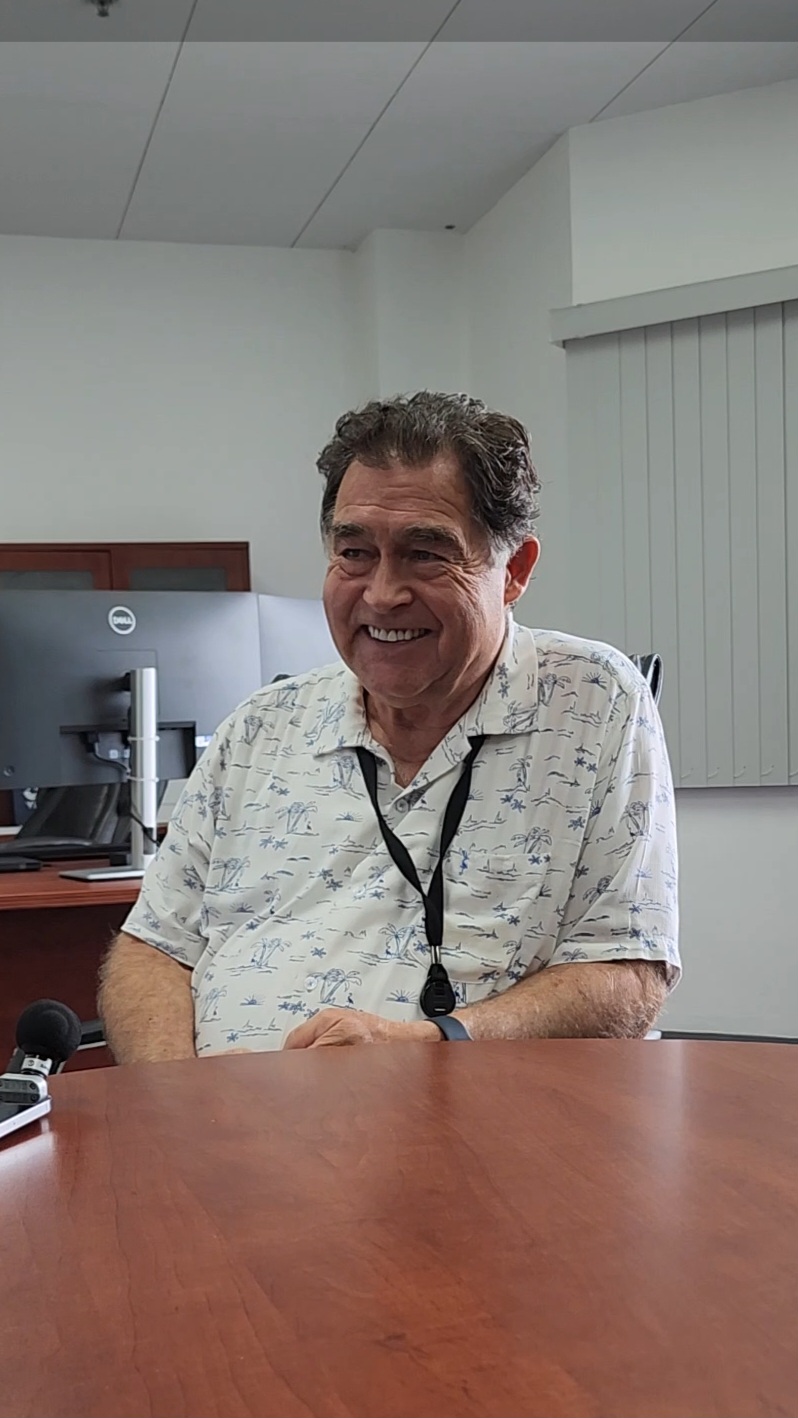 Commonwealth Utilities Corporation Executive Director Kevin Watson smiles at reporters who were interviewing him in his office last week.
