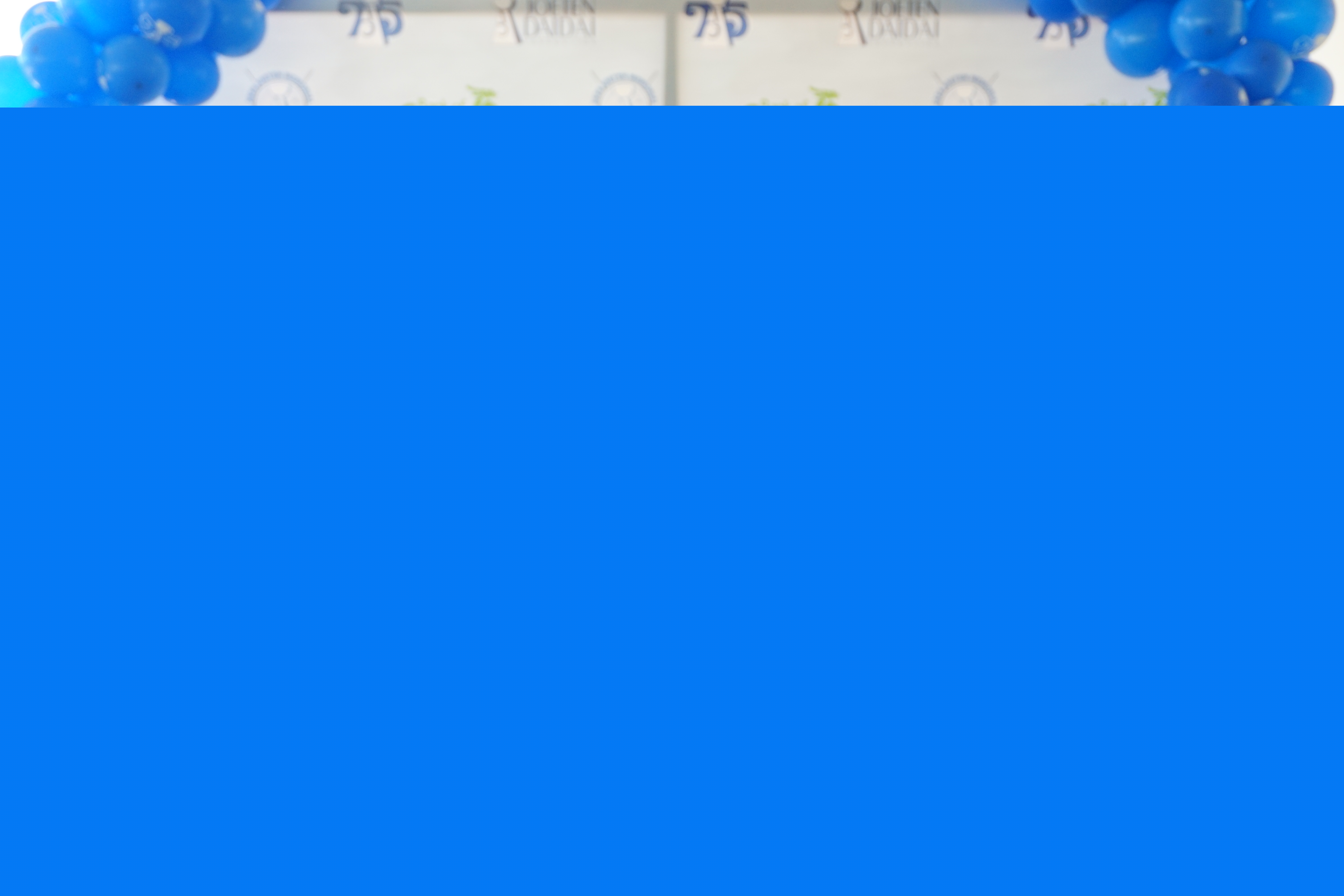 Hyun Son, center, displays the Ladies Flight trophy as she poses for a photo with Committee Chair Shigeki Tenorio, left, and Tournament Director Peter "Dung" Tenorio, right, during the awards ceremony of the 2024 Joeten Memorial Classic at Laolao Bay Golf & Resort on Saturday.