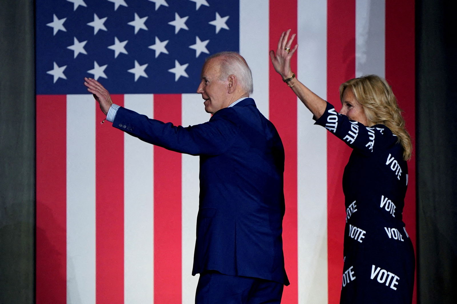 President Joe Biden and first lady Jill Biden wave as they exit the stage during a campaign rally in Raleigh, North Carolina, June 28, 2024.