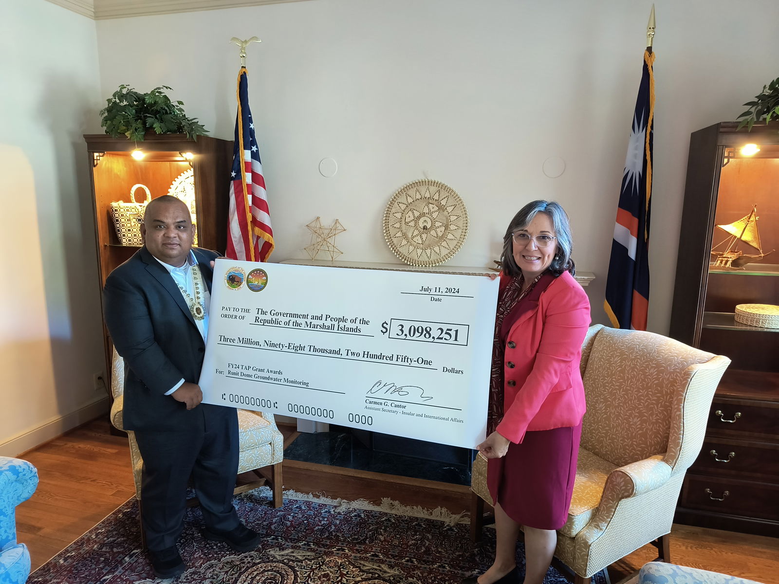Interior’s Assistant Secretary for Insular and International Affairs Carmen G. Cantor with Republic of the Marshall Islands Ambassador Charles Paul at the RMI Embassy in Washington, D.C.