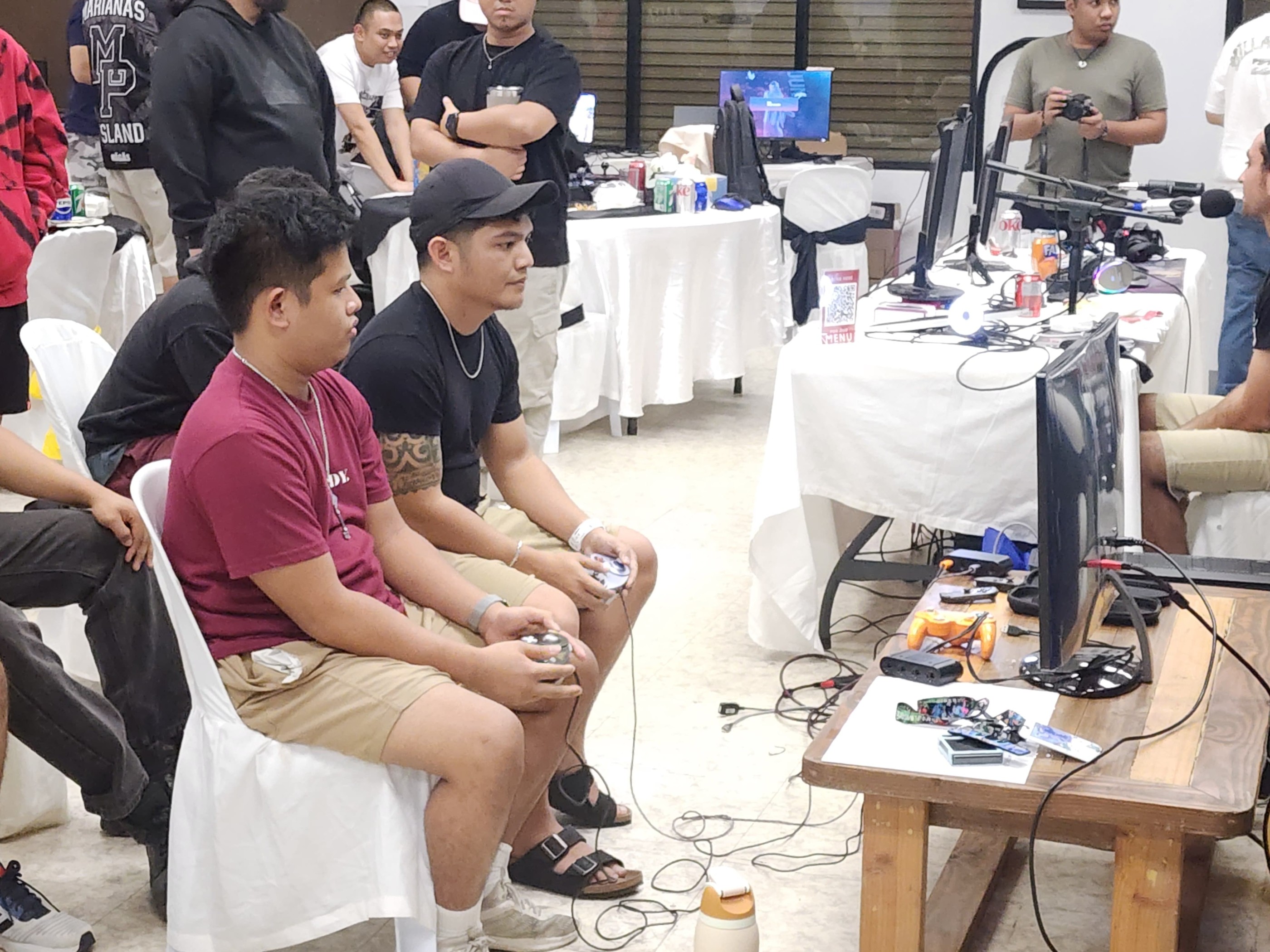 Raybrent Iglecias and Patrick Pagdato battle it out in the finals of the Super Smash Bros. Ultimate tournament of the Rotaract Club of Saipan's Summer Showdown Vol.2 at Pepoy’s Café and Restaurant on Saturday.