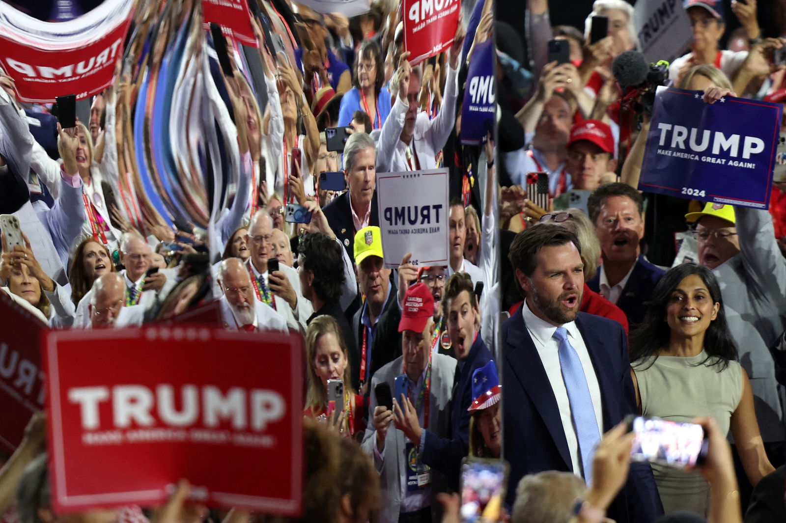 Republican vice presidential candidate J.D. Vance is accompanied by his wife Usha Chilukuri Vance as he arrives for Day 1 of the Republican National Convention at the Fiserv Forum in Milwaukee, Wisconsin, July 15, 2024.