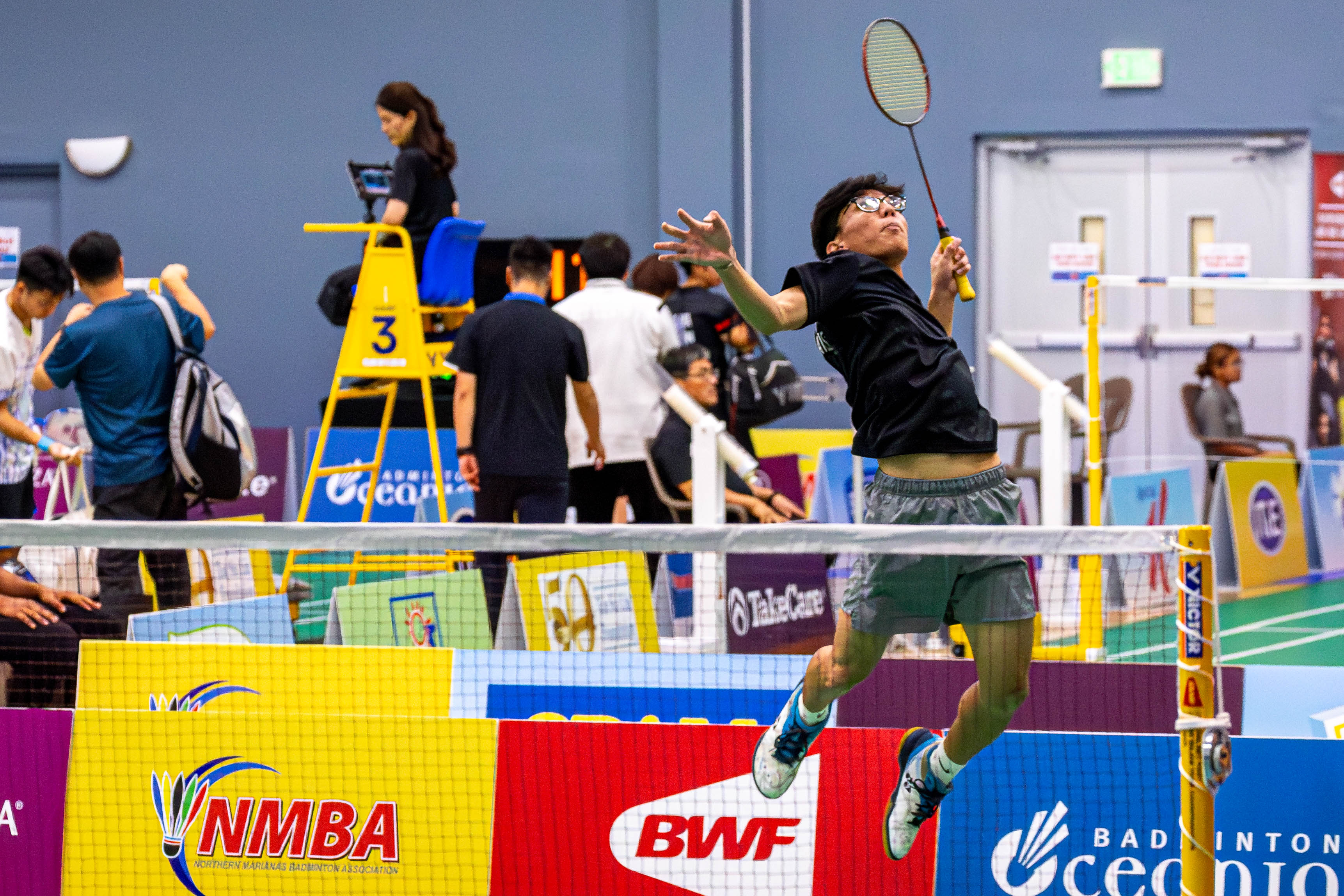 The NMI's Dave Odicta leaps into the air for the spike return during a Men's Doubles match against Japan in the Crowne Plaza Northern Marianas Open 2024 at the Ada gym on Wednesday.