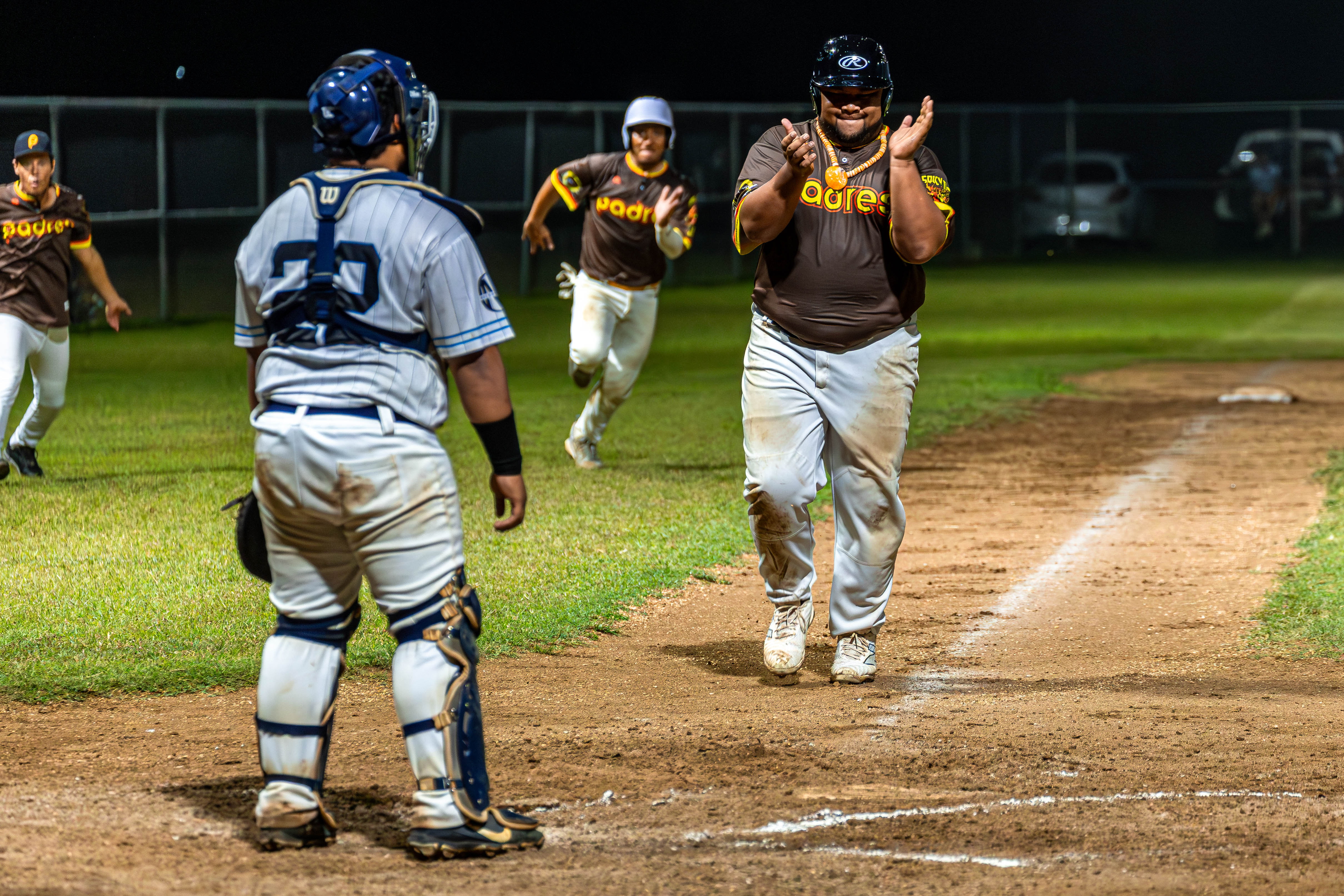 Padre's 3rd Baseman Darion Jones applauds the hit his teammate made to secure 2 RBIs against the Falcons.