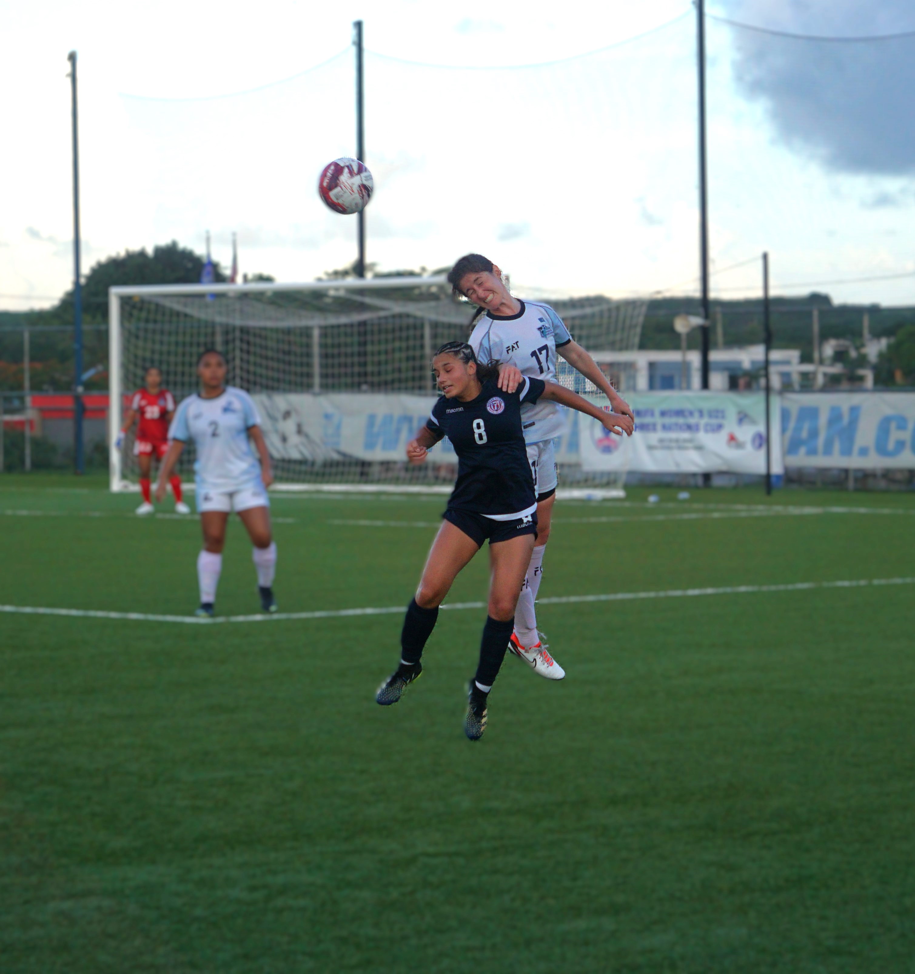 The NMI's Gabrielle Race connects the header over Guam's Olivia Haddock during a match of the NMIFA U21 Women's Three Nations Cup 2024 at the NMI Soccer Training Center on Sunday.