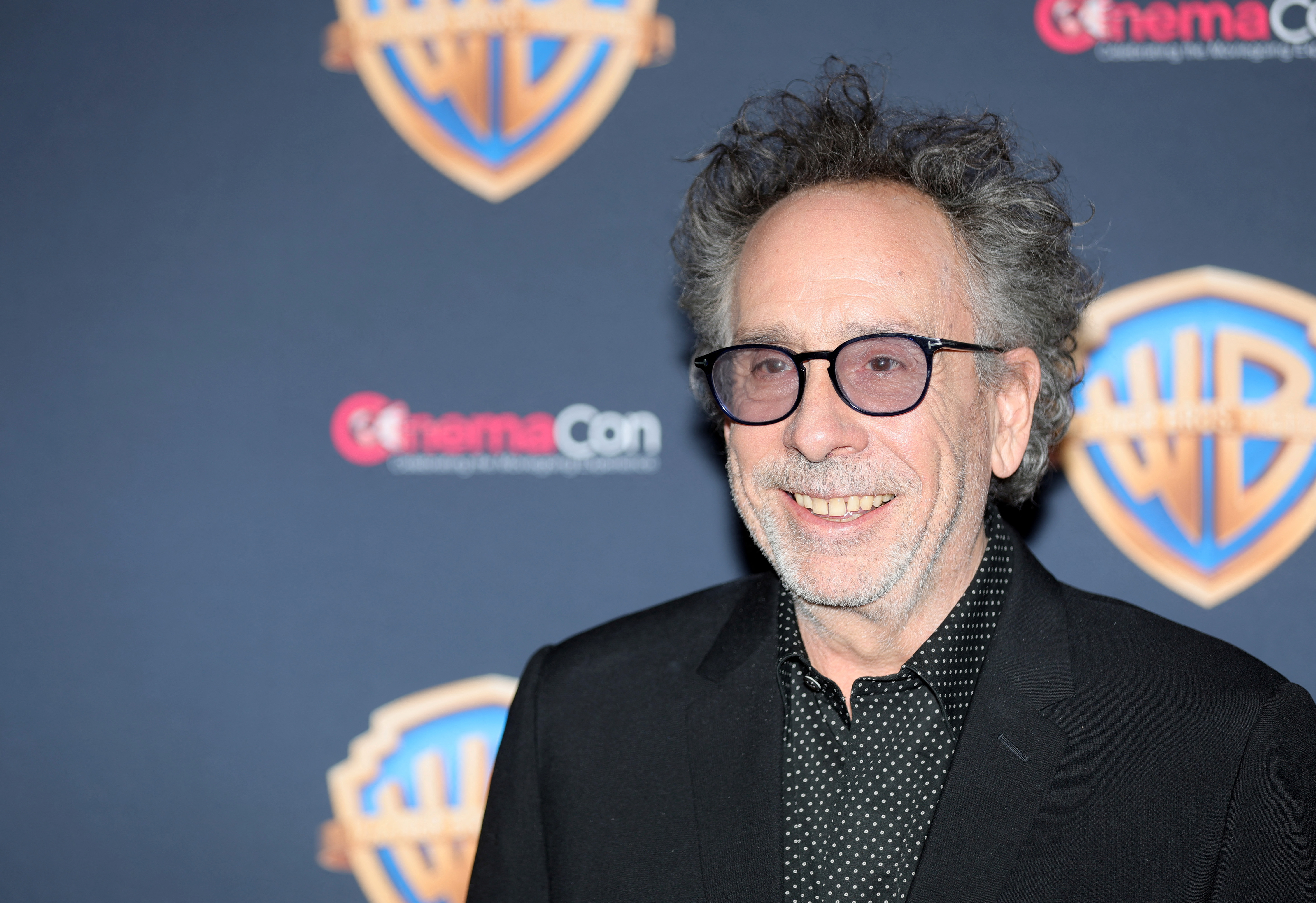 Director and producer Tim Burton, promoting the film Beetlejuice Beetlejuice, poses on the red carpet during a Warner Bros. presentation at CinemaCon, the official convention of the National Association of Theatre Owners, in Las Vegas, Nevada, April 9, 2024.