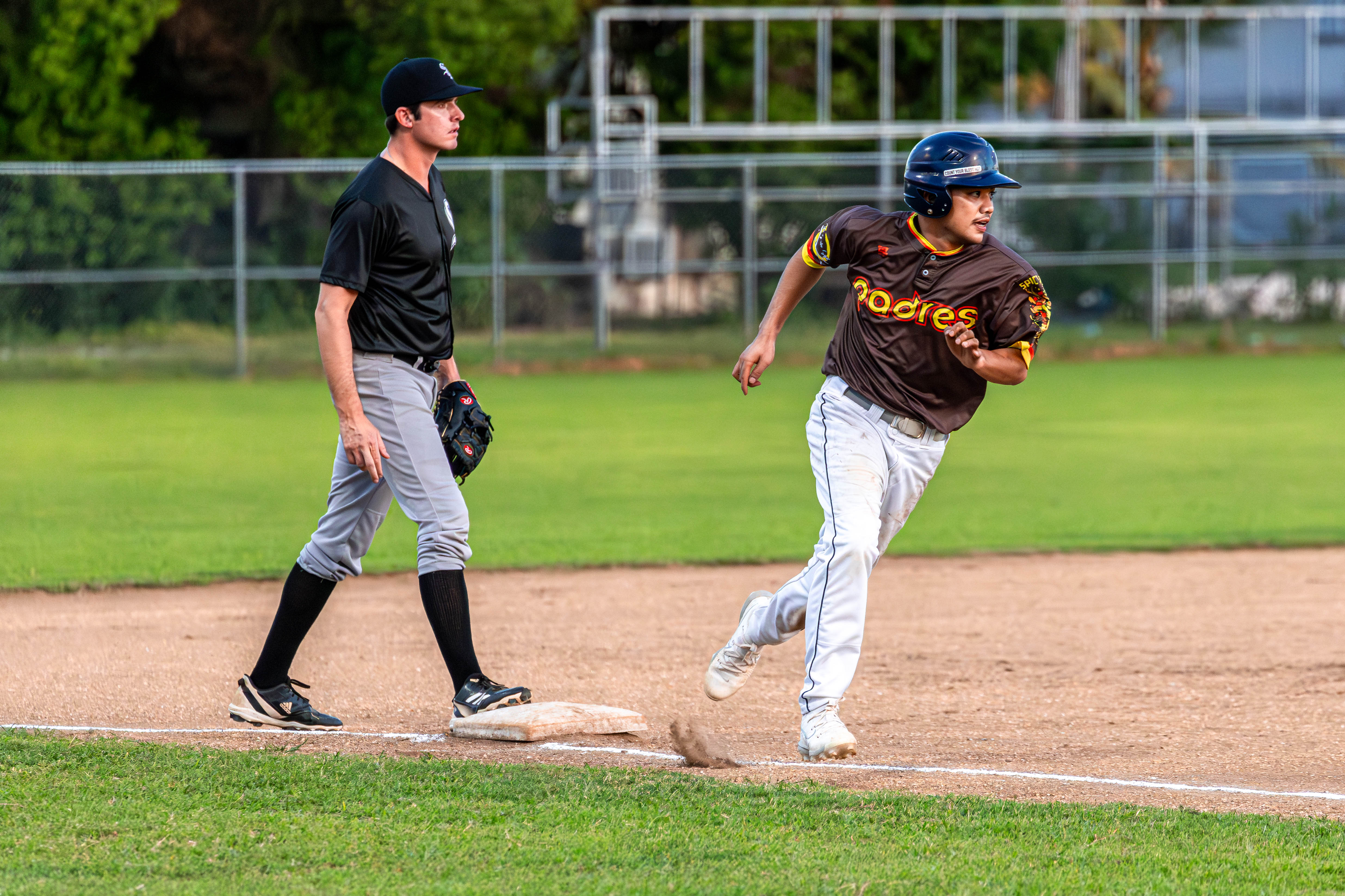 The Padres' Kolby Lifoifoi rushes toward home to score a run during a game against the White Sox in the 2024 Tan Holdings Saipan Baseball League at the Francisco "Tan Ko" Palacios Baseball Field on Monday.