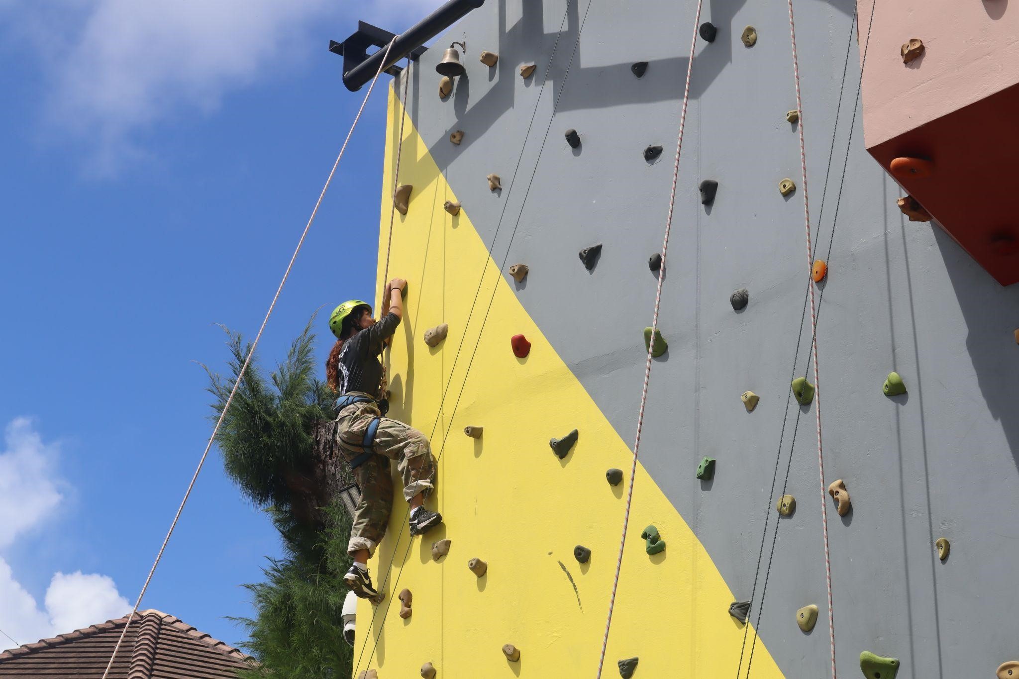 Stallion Battalion Adjutant Officer C/1LT Isa Dosalua participates in a rock-climbing activity.