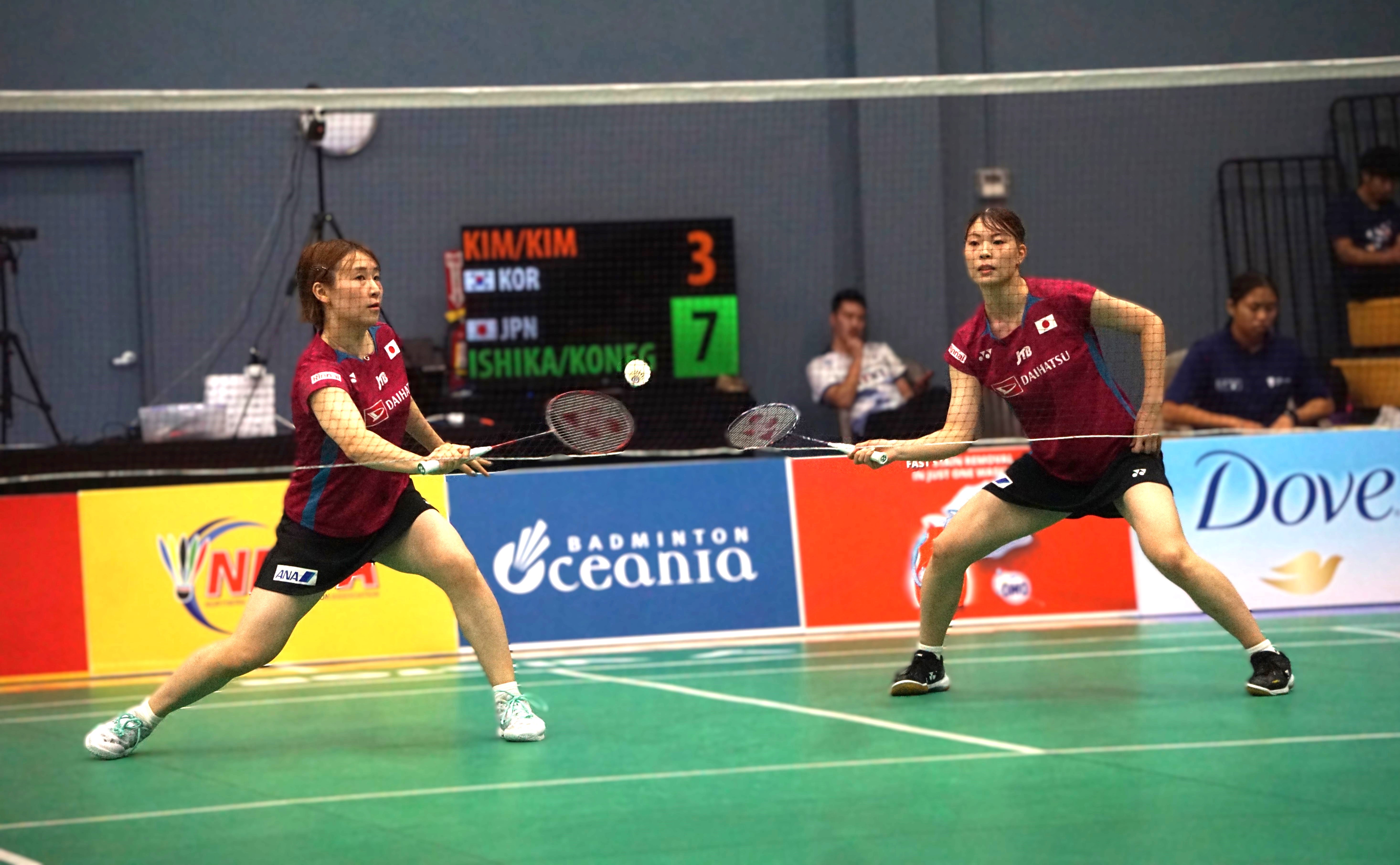 Japan's Kokona Ishikawa and Mio Konegawa reach for the return against Korea's Hya Jeong Kim and Yu Jung Kim in the women's doubles finals match of the Dove Saipan International 2024 at the Ada gym on Saturday.