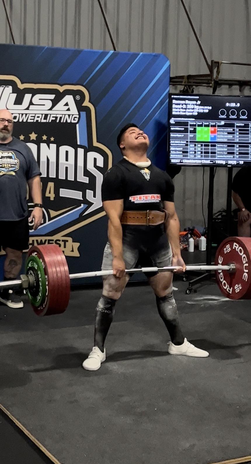 Roman Reyes Jr. smiles as he successfully lifts his final deadlift attempt of 300kg/661.3lbs during the USA Powerlifting Northwest Regional Championships in Puyallup, Washington state on Saturday.