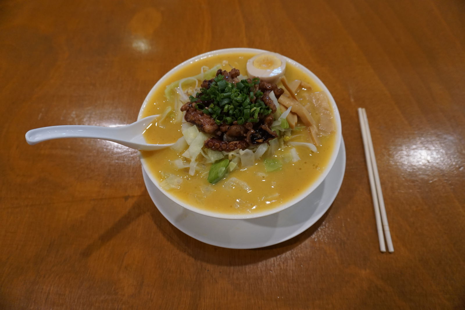 Topped with octopus and featuring a broth made with miso, butter, garlic and tonkotsu, the octopus garlic butter ramen is hearty and delicious.
