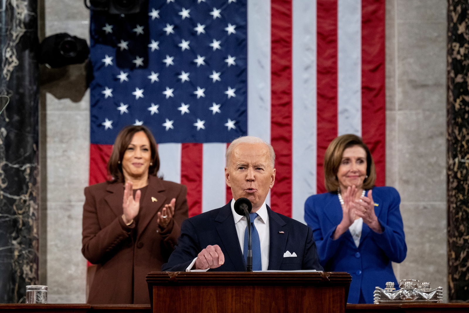 President Joe Biden delivers the State of the Union address at the U.S. Capitol in Washington, D.C., March 1, 2022. Behind him are Vice President Kamala Harris and then-Speaker Nancy Pelosi.