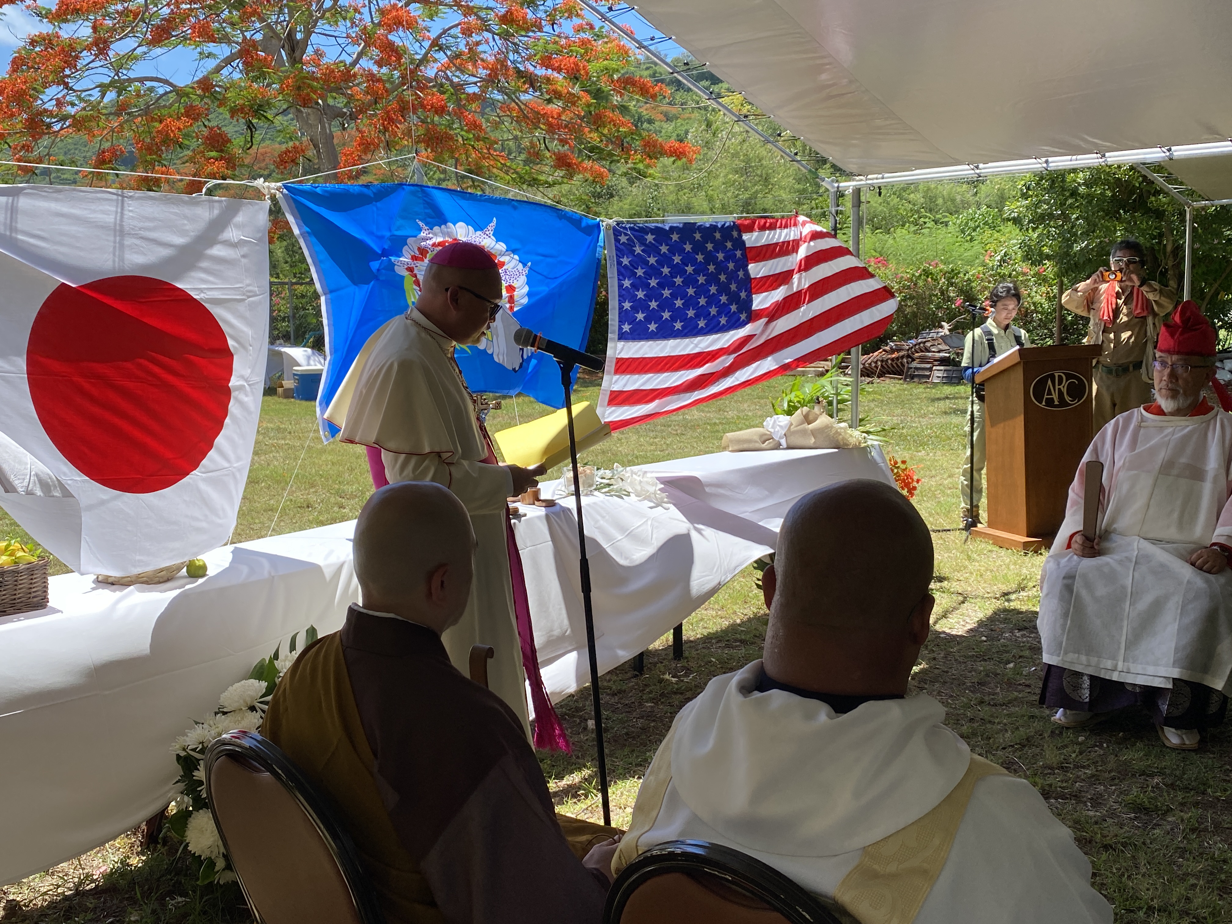 Bishop Ryan Jimenez leads a prayer at the 5th Joint Memorial Service in Achugao.