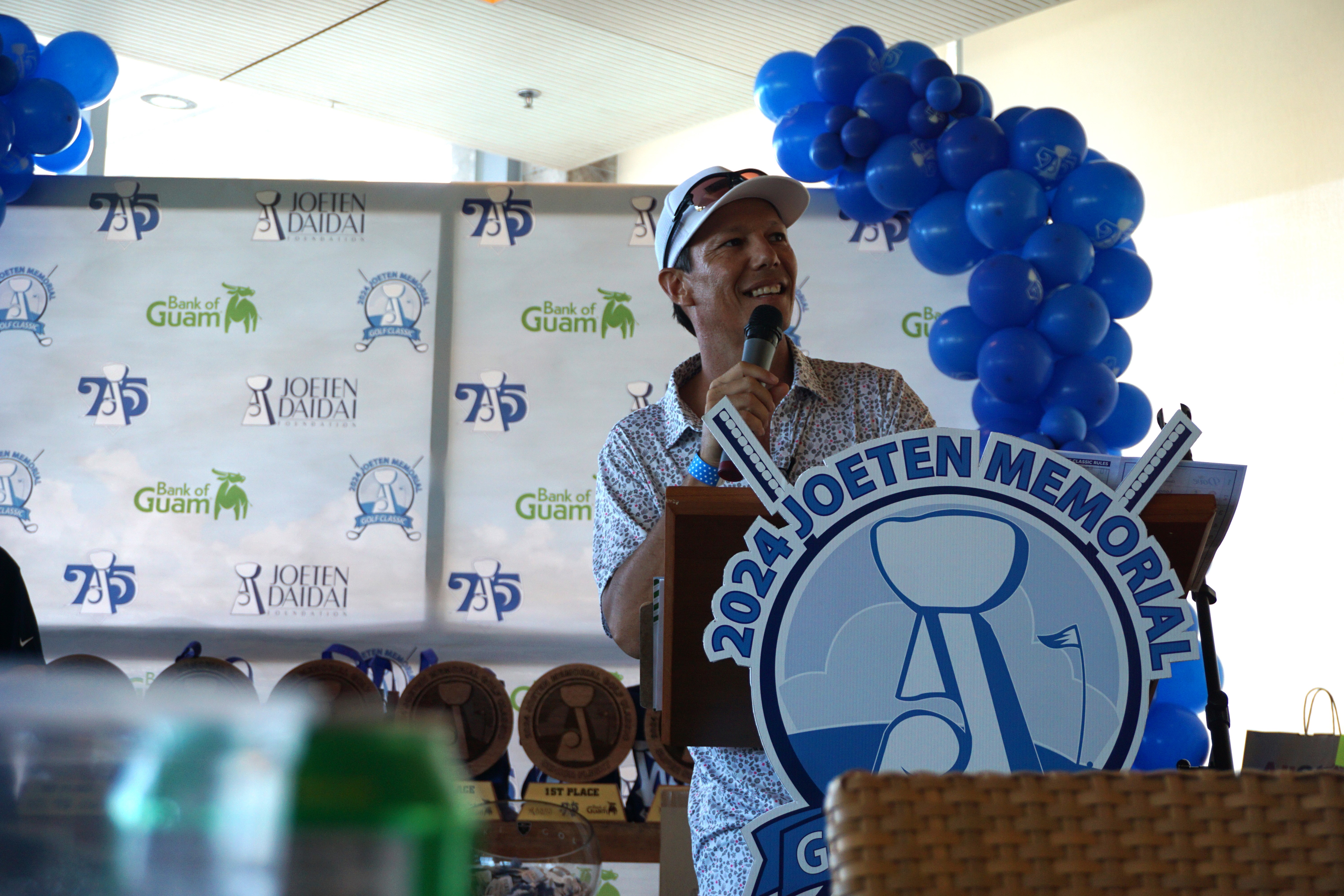 Tournament Director Peter "Dung" Tenorio speaks during the award ceremony of the 2024 Joeten Memorial Classic at Laolao Bay Golf & Resort on Saturday.