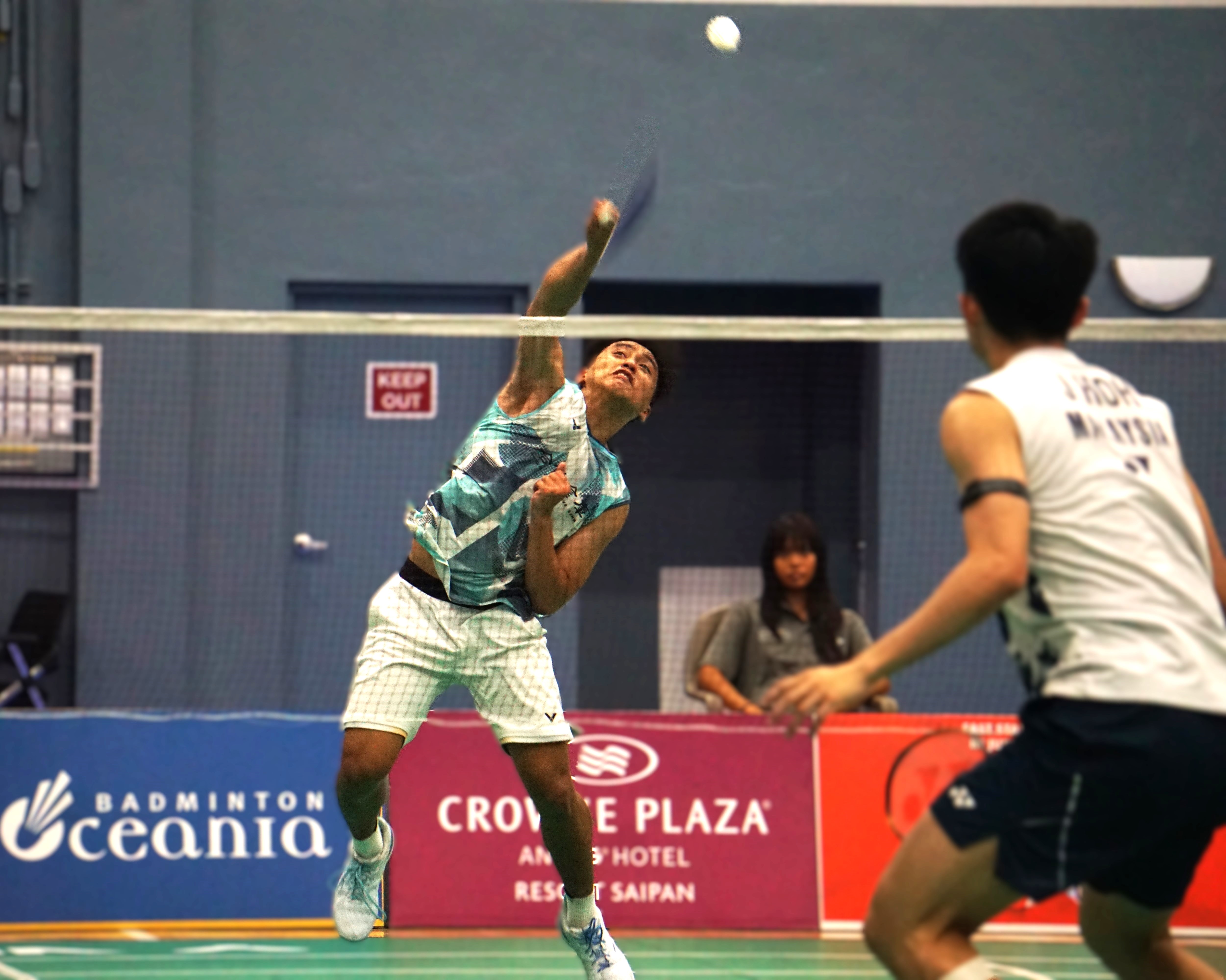 Chinese Taipei's Cheng Kai connects the smash return against Malaysia's Justin Hoh during the men's singles finals of the Crowne Plaza Northern Marianas Open 2024 at the Ada gym on Sunday.