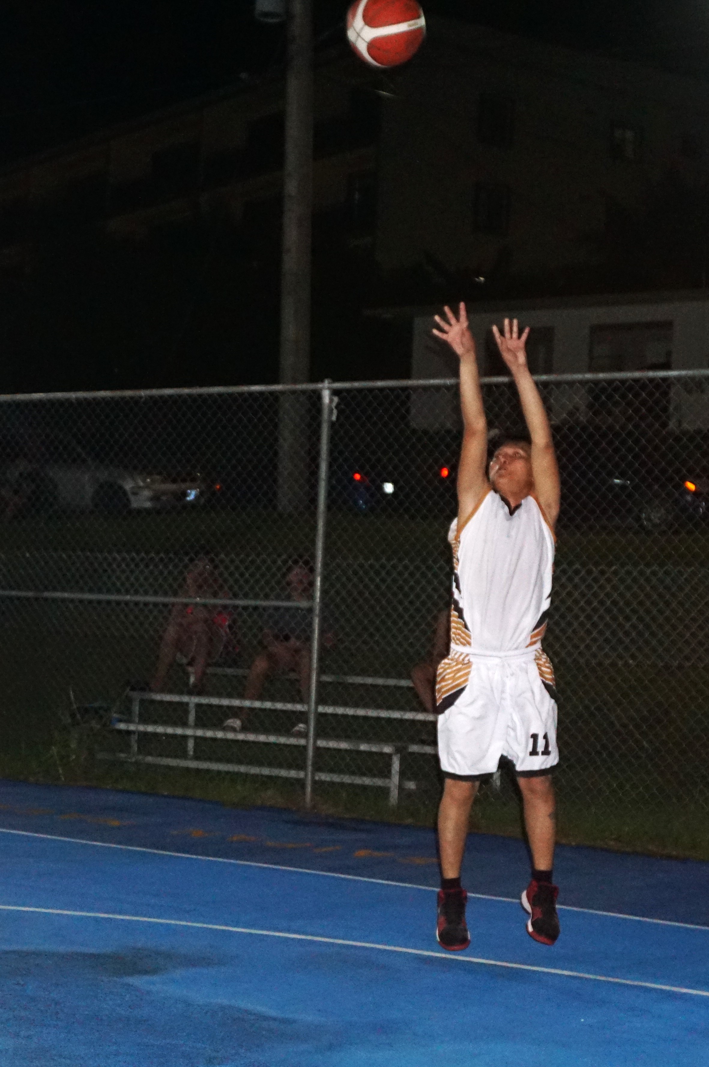 Tsingtao's Johnmark Armes takes the open three-point shot during a game against UMI in the Win Pacific Corporation Invitational Basketball League 2024 at the Gualo Rai court on Tuesday.