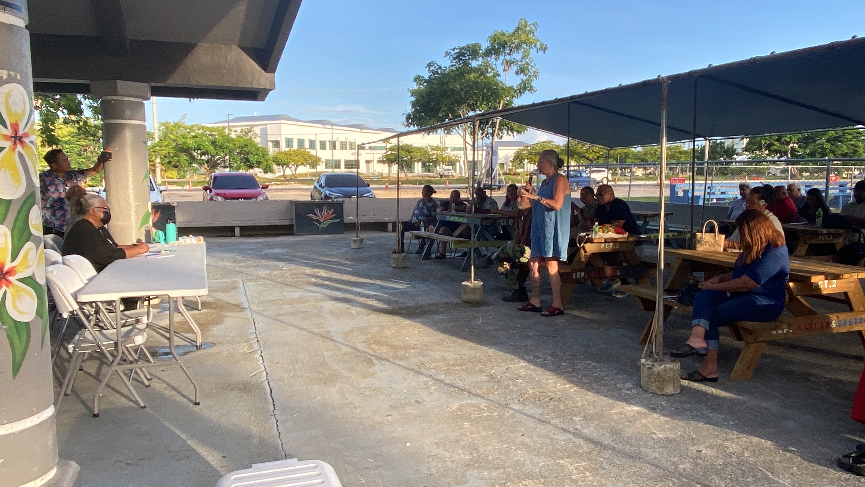 Emma Perez, standing right, 500 Sails co-founder, hopes canoes are featured in the plans for the proposed cultural events center. 