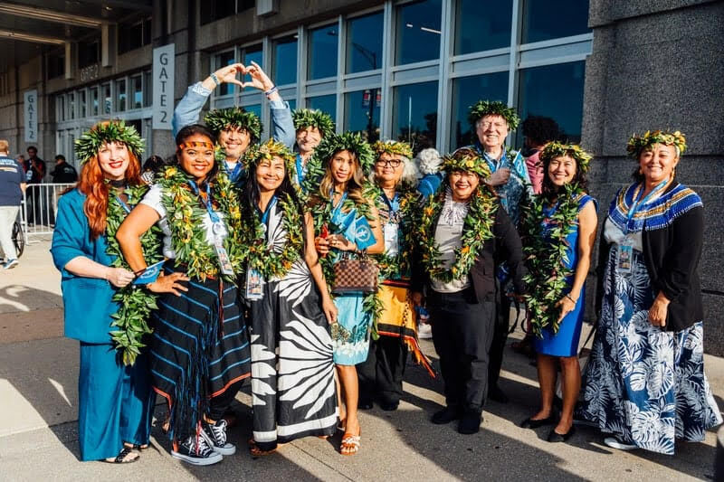 The NMI delegates to the Democratic National Convention pose for a photo at United Center in Chicago, Illinois.