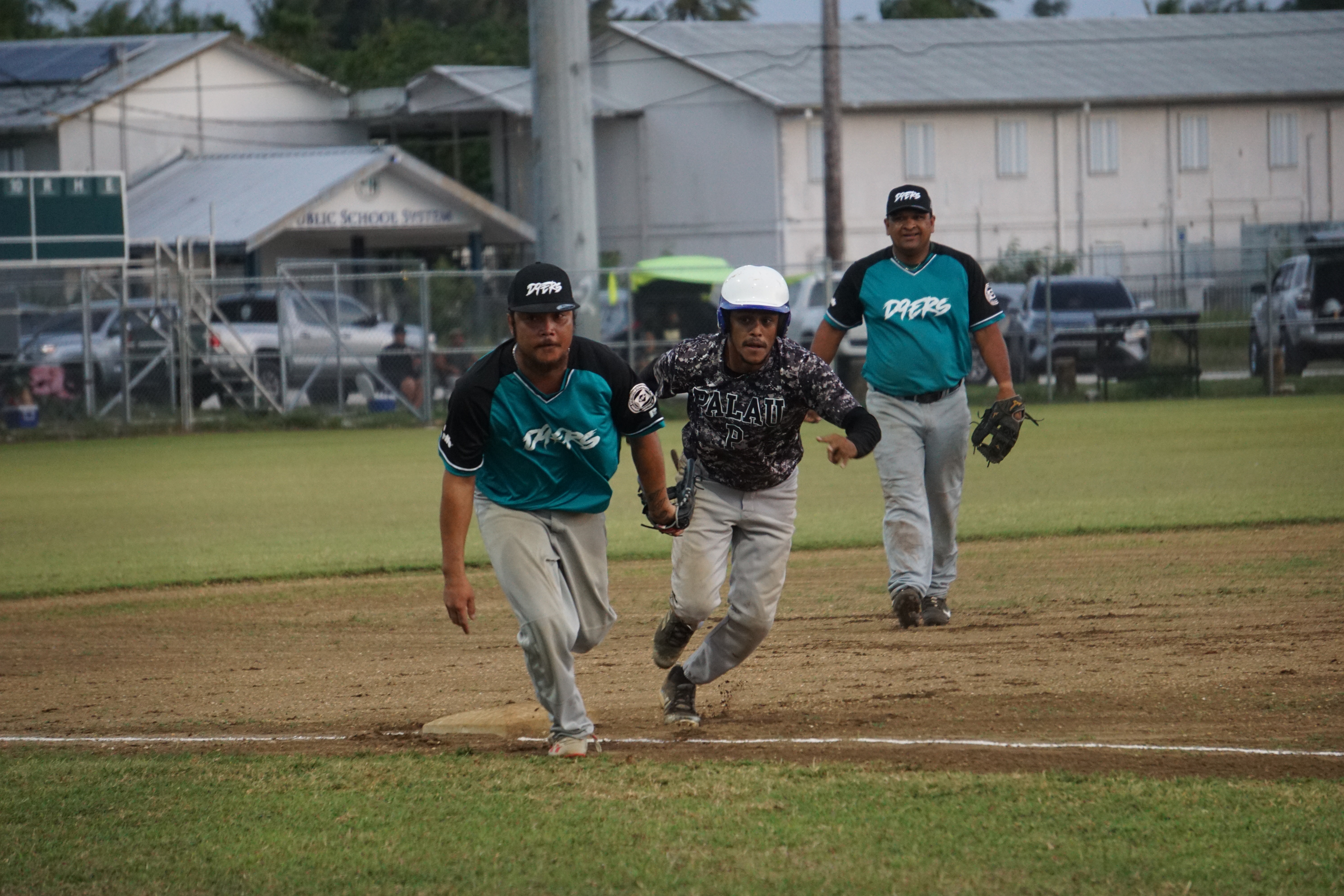 The Natives’ Cameron Towai attempts to run home after an error was made by the D-9er's during a game of the 2024 Tan Holdings Saipan Baseball League at the Francisco "Tan Ko" Palacios baseball field.