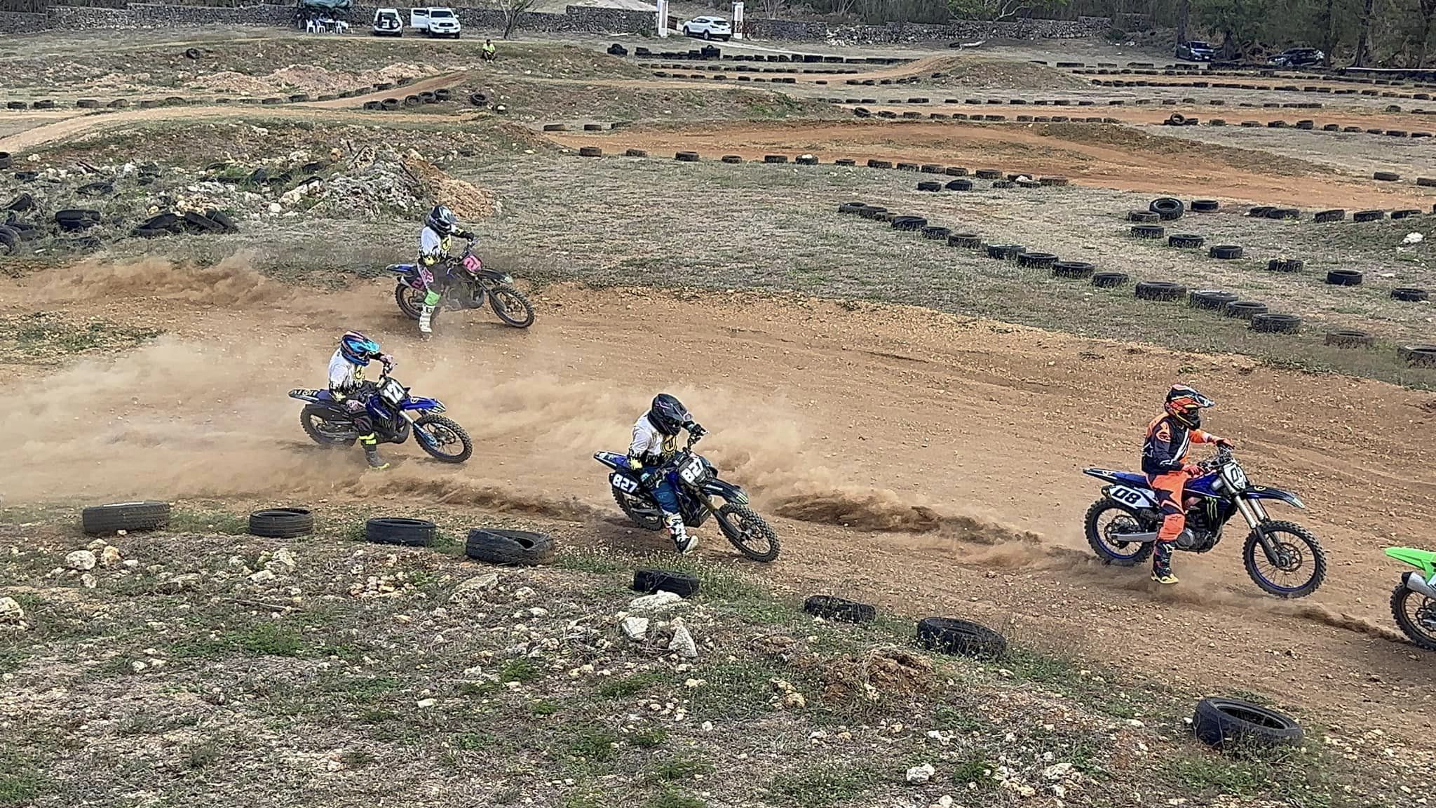 Riders fight for the lead in the Mini II class during the MRA "MotoIV" 2024 Points Race Series at the CowTown Raceway Park.