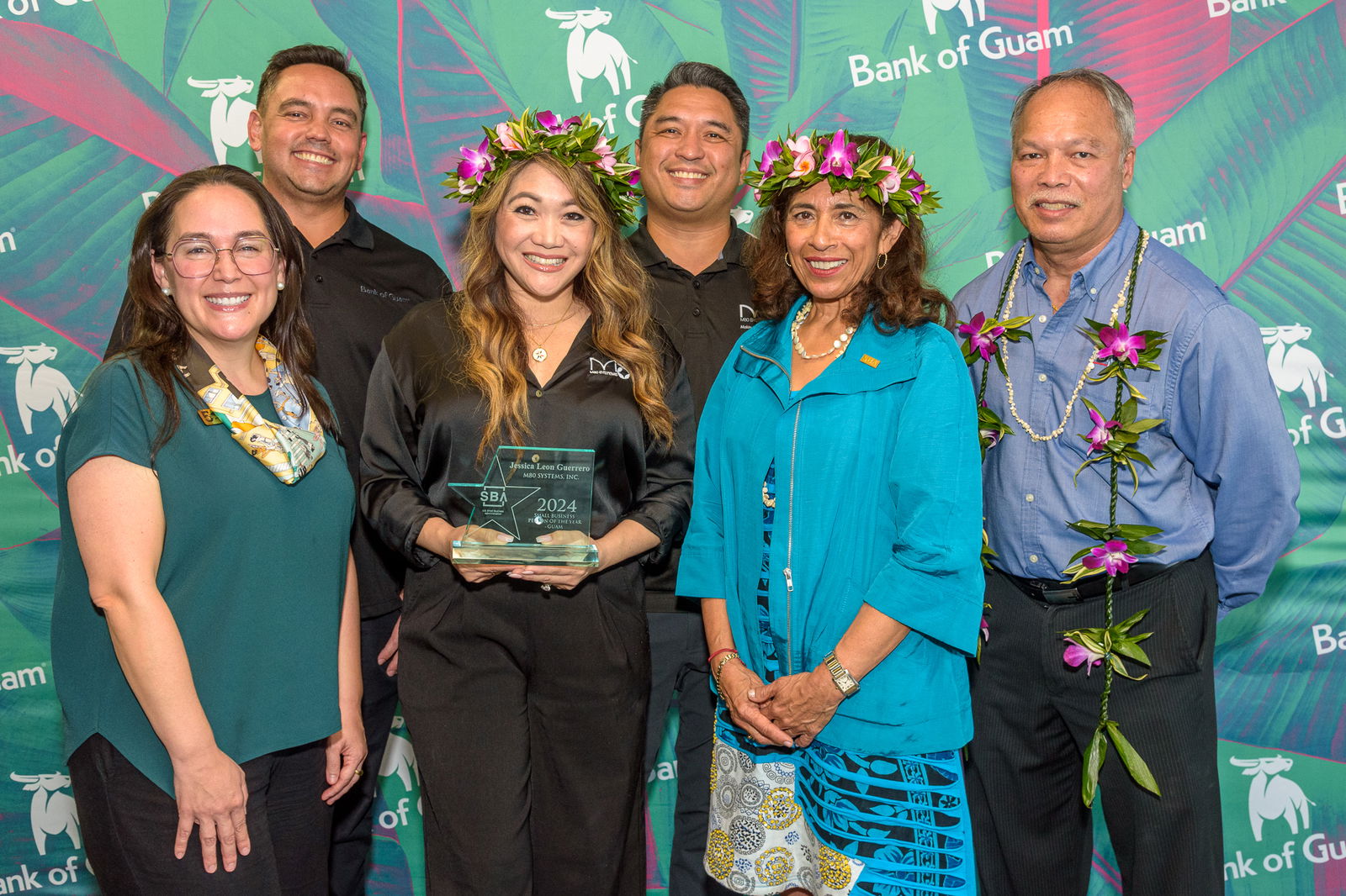 Bank of Guam congratulates Jessica Leon Guerrero, president, M80 Systems Inc. on being awarded the U.S. Small Business Administration’s 2024 Guam Small Business Person of the Year. Pictured, from left, Maria Eugenia H. Leon Guerrero, executive vice president and chief operating officer, Bank of Guam; Joaquin P. L.G. Cook, president and chief executive officer, Bank of Guam; Jessica Leon Guerrero, president and owner, M80 Systems Inc.; Carlo Leon Guerrero, vice president and general manager, M80 Systems Inc.; Elmy Bermejo, regional administrator, U.S. SBA; and Kenneth Q. Lujan, branch manager.