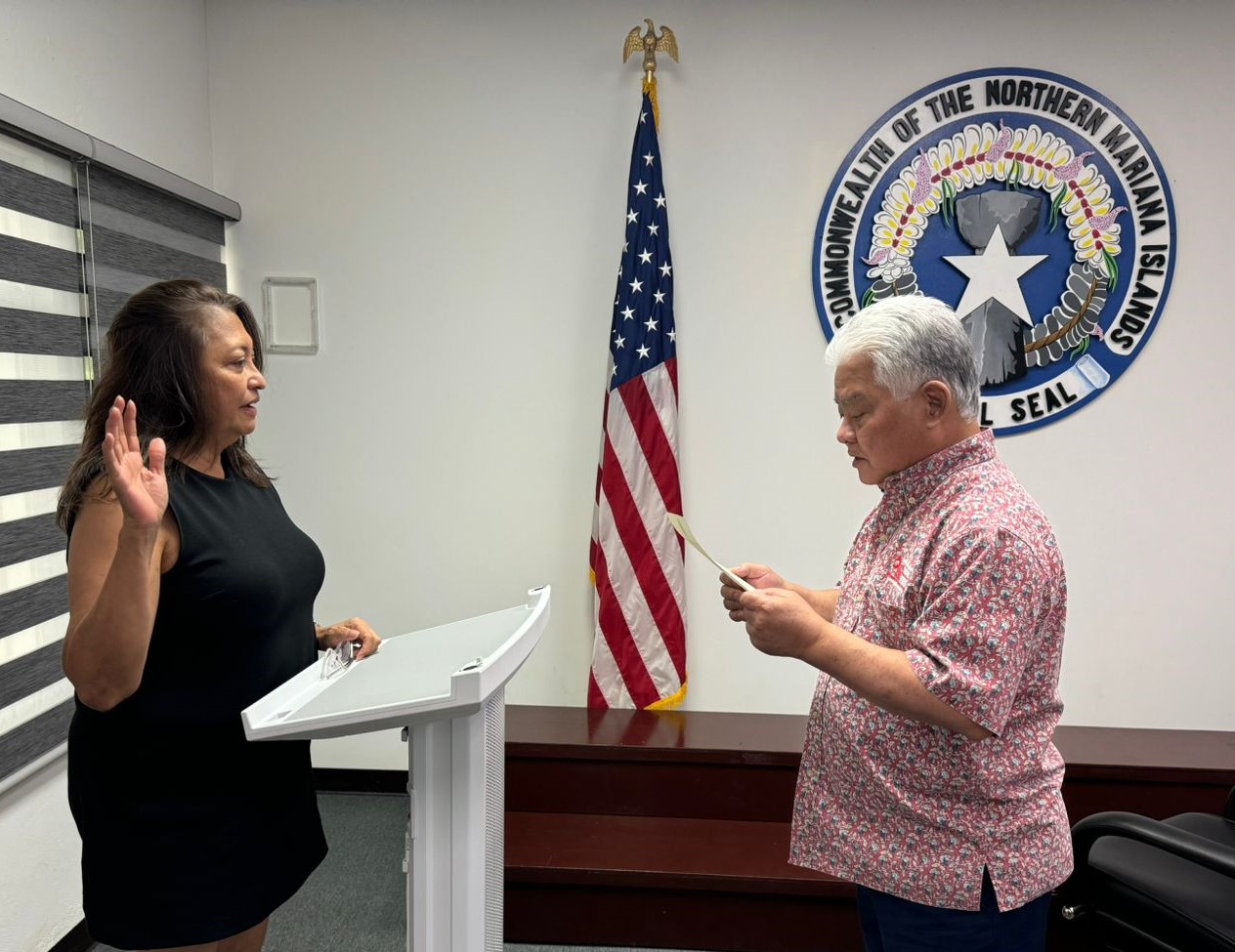 Gov.  Arnold I. Palacios swears in Gloria Cavanagh of MB Capital Corp. to the Marianas Visitors Authority board of directors on Aug. 20, 2024, at the Office of the Governor on Capital Hill, Saipan. Cavanagh was also elected to continue as board chairperson at the MVA board meeting on Aug. 21, 2024.