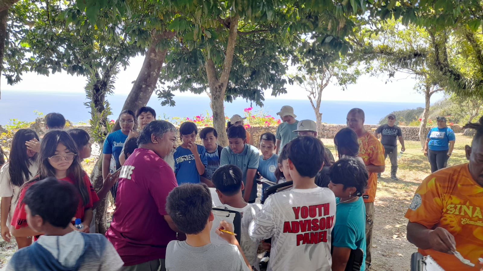 Students learn about seabirds at the I'Chenchon Seabird Sanctuary from Wildlife Officer Ulloa on Rota.