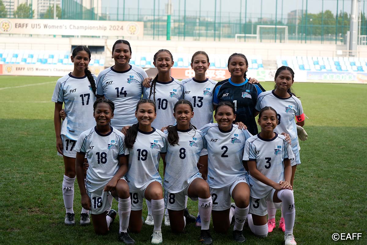 The NMI Women's U15 National Team members pose for a group photo before their match against Macau in the East Asian Football Federation U15 Women’s Championship 2024 at the Dalian Football Youth Training Centre in China on Friday.