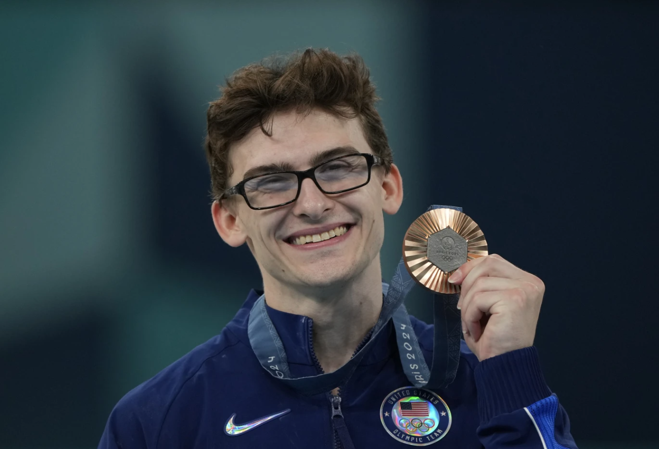 Stephen Nedoroscik of the United States celebrates after winning the bronze medal in the men’s artistic gymnastics individual pommel finals at Bercy Arena at the 2024 Summer Olympics, Aug. 3, 2024, in Paris, France.