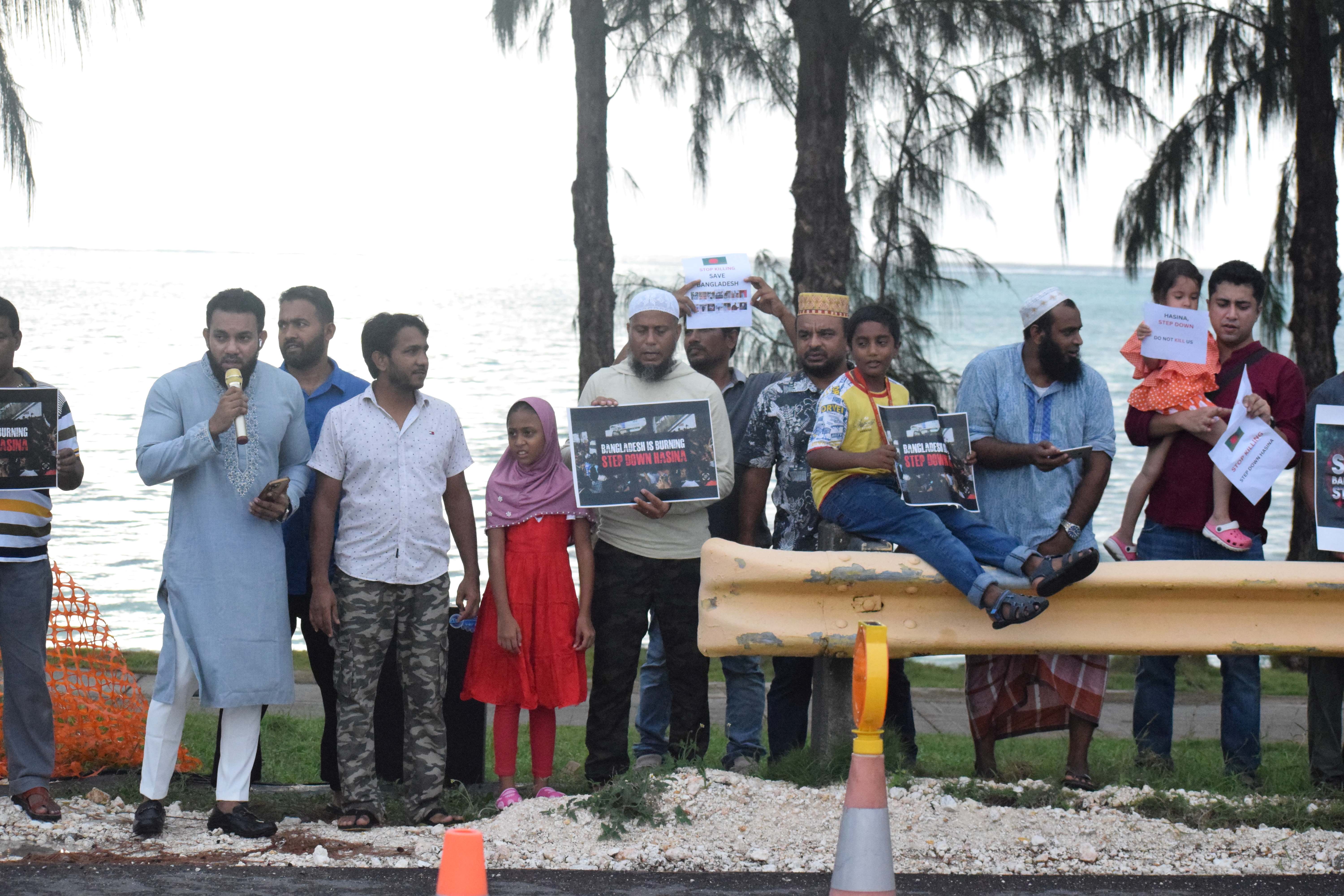 Bangladesh community members gather at Atkins Kroll intersection in San Jose to protest the killing of innocent students in their home country.