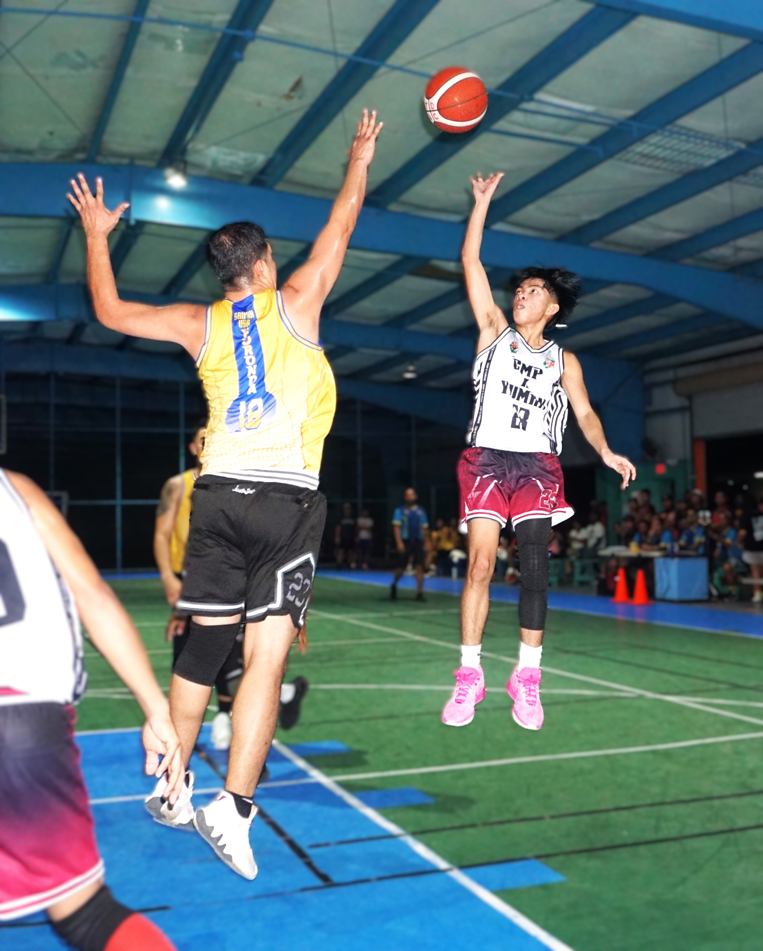 GMP x Yuman's Sean Licayan takes the floater over a defender during a semifinal game against Savemore in the 2024 Destroyers Basketball Club Invitational Basketball League at the TSL Sports Complex.