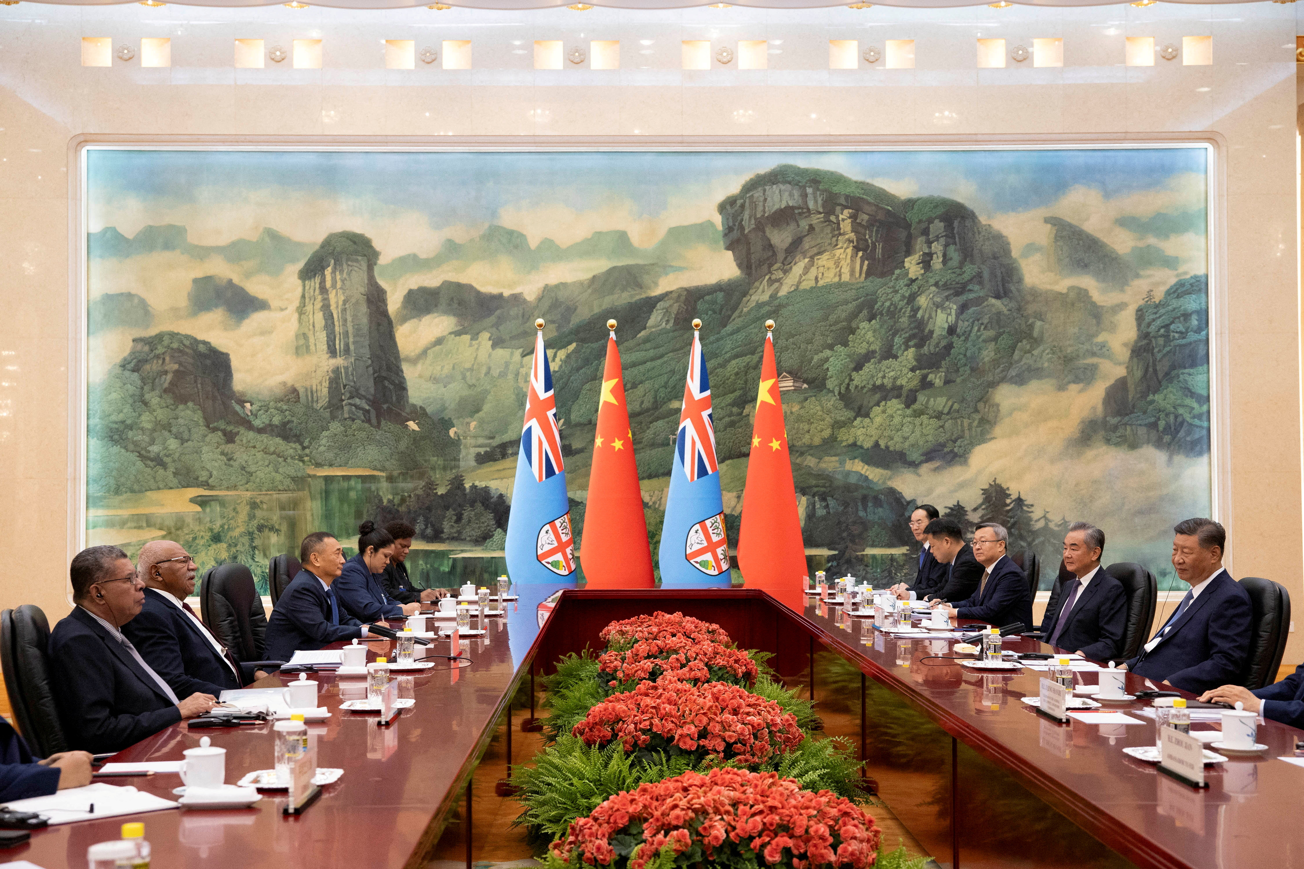 Fiji’s Prime Minister Sitiveni Rabuka and Chinese President Xi Jinping attend a meeting at the Great Hall of the People in Beijing, China, Aug. 20, 2024.