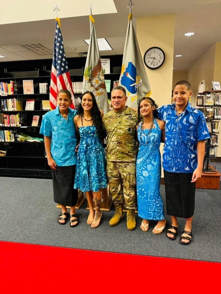 Col. Robert Le'iato and family.