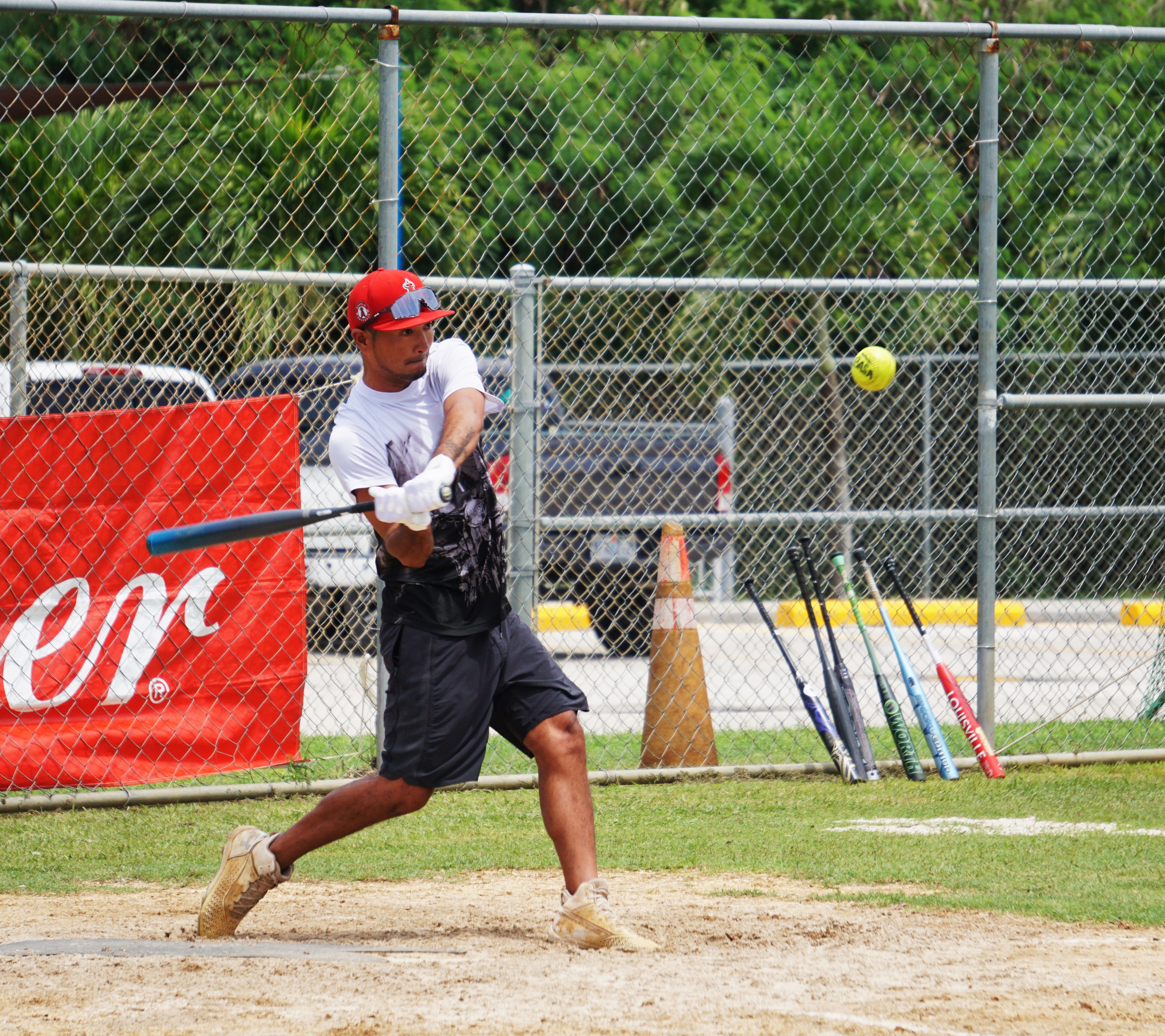 The Kliq's KJ Villagomez is about to connect a single during a game of the 2024 Budweiser Belau Amateur Softball Association Open League at the Dandan baseball field. 