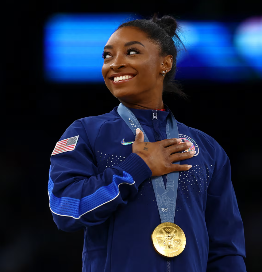 Simone Biles of United States celebrates on the podium with her Olympic gold medal during the women’s vault victory ceremony at Bercy Arena in Paris, France on Aug. 3, 2024.